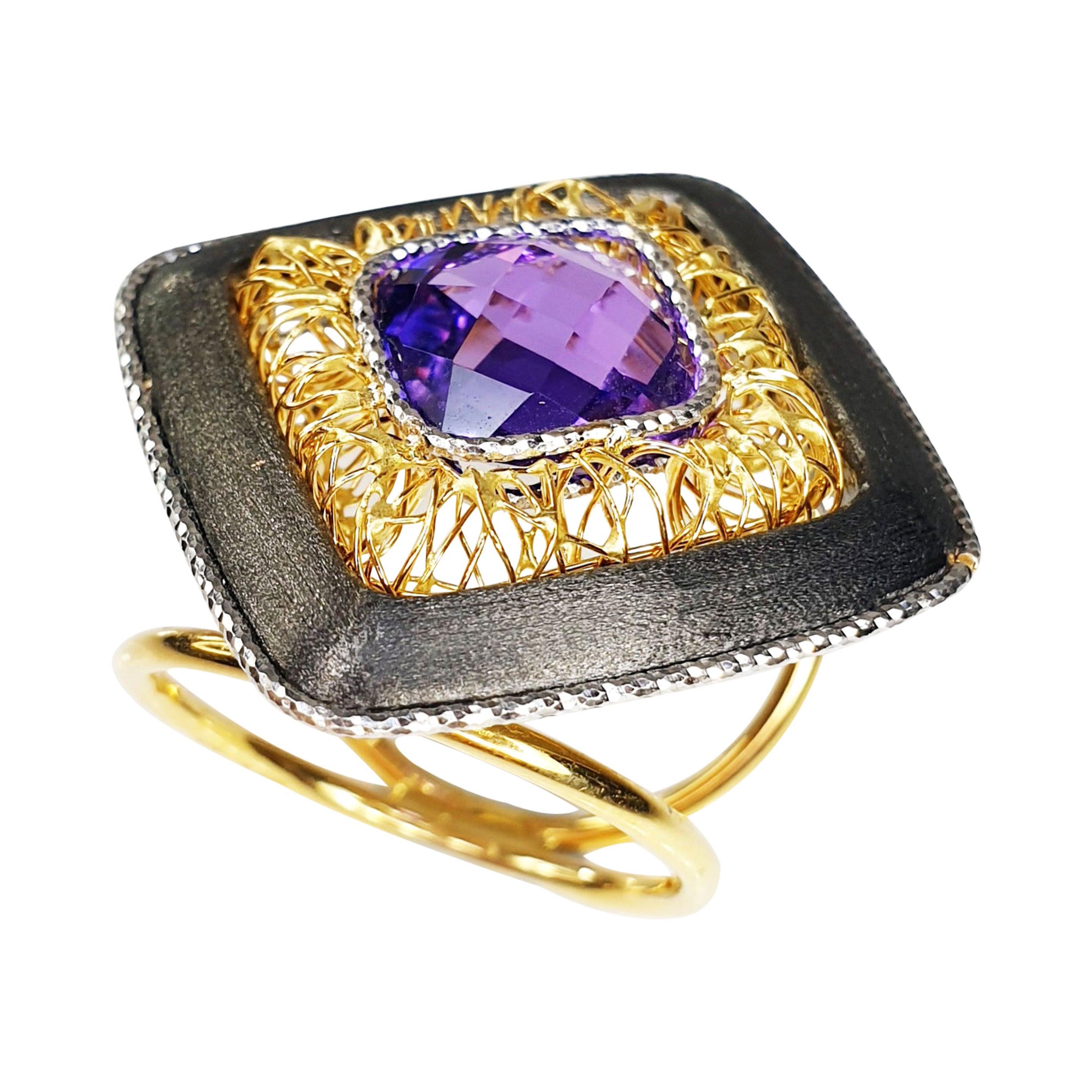 For Sale:  Multifaceted Amethyst in Titatium and 18 Karat White and Yellow Gold Ring