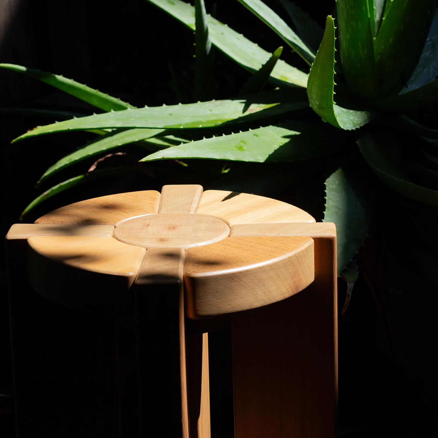 Contemporary Multiflora, Stool or Side-Table, made of teak inspired by symbols. For Sale