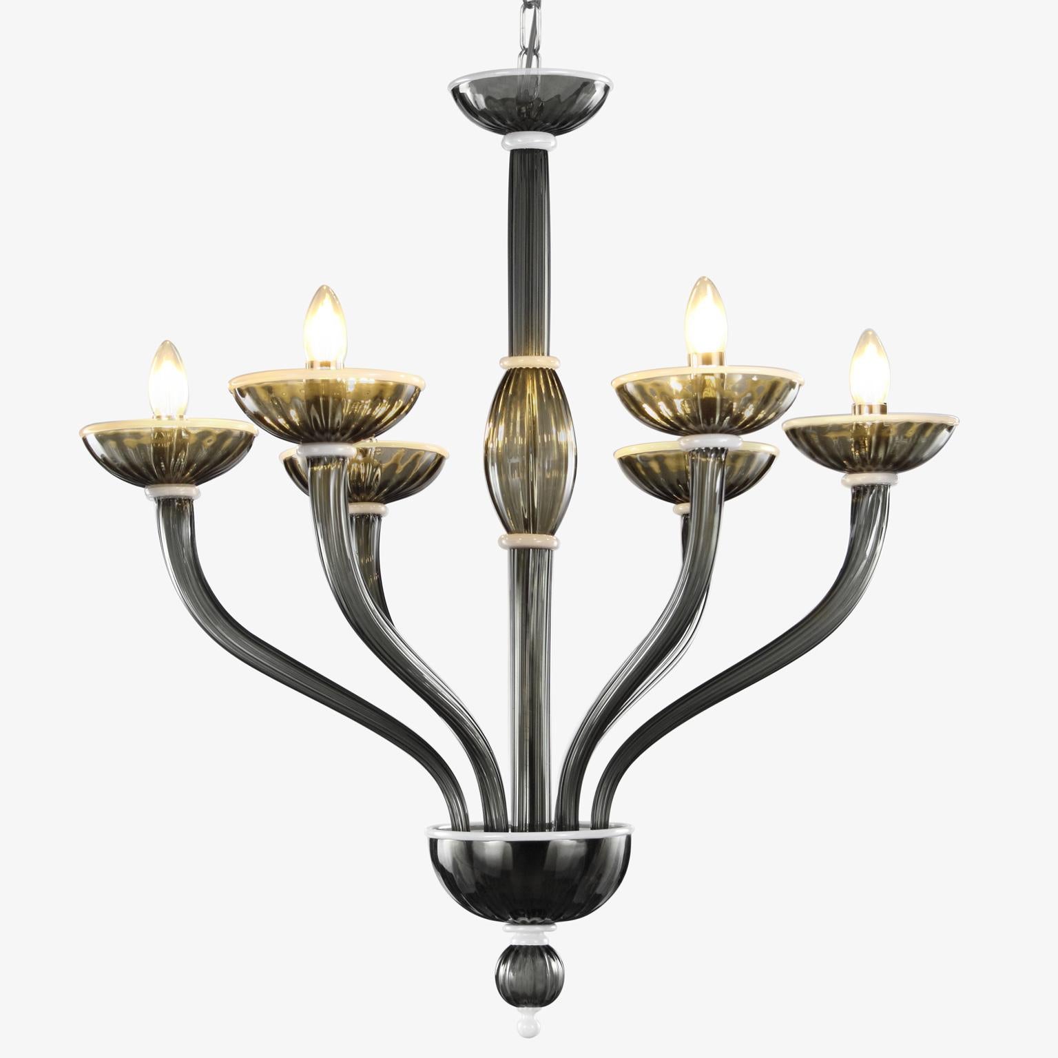 Velvet chandelier 6 lights. Dark grey Murano glass with white details. Climbing arms by Multiforme.

The blown glass velvet Venetian chandelier is inspired from the Art Deco style. It is characterized by long arms which are bended upwards and by