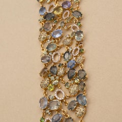 Bracciale multigemma con zaffiro, tormalina e diamanti in oro giallo 18 carati