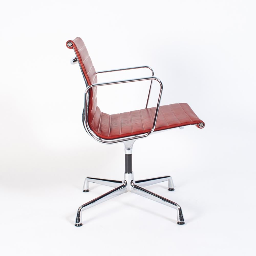 German Multiple Eames Aluminum Group Chairs EA108 in Chrome and Red Leather, Vitra For Sale