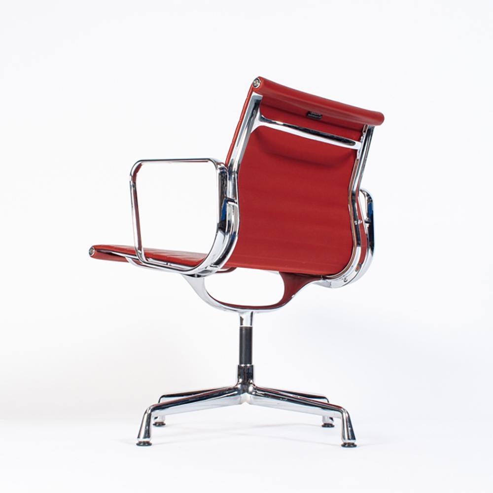 Multiple Eames Aluminum Group Chairs EA108 in Chrome and Red Leather, Vitra In Good Condition For Sale In Amsterdam, NL