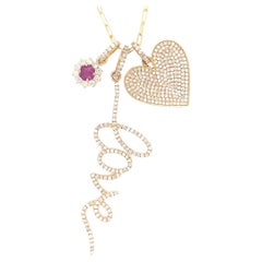 Multiple gold diamond and ruby pendant necklace