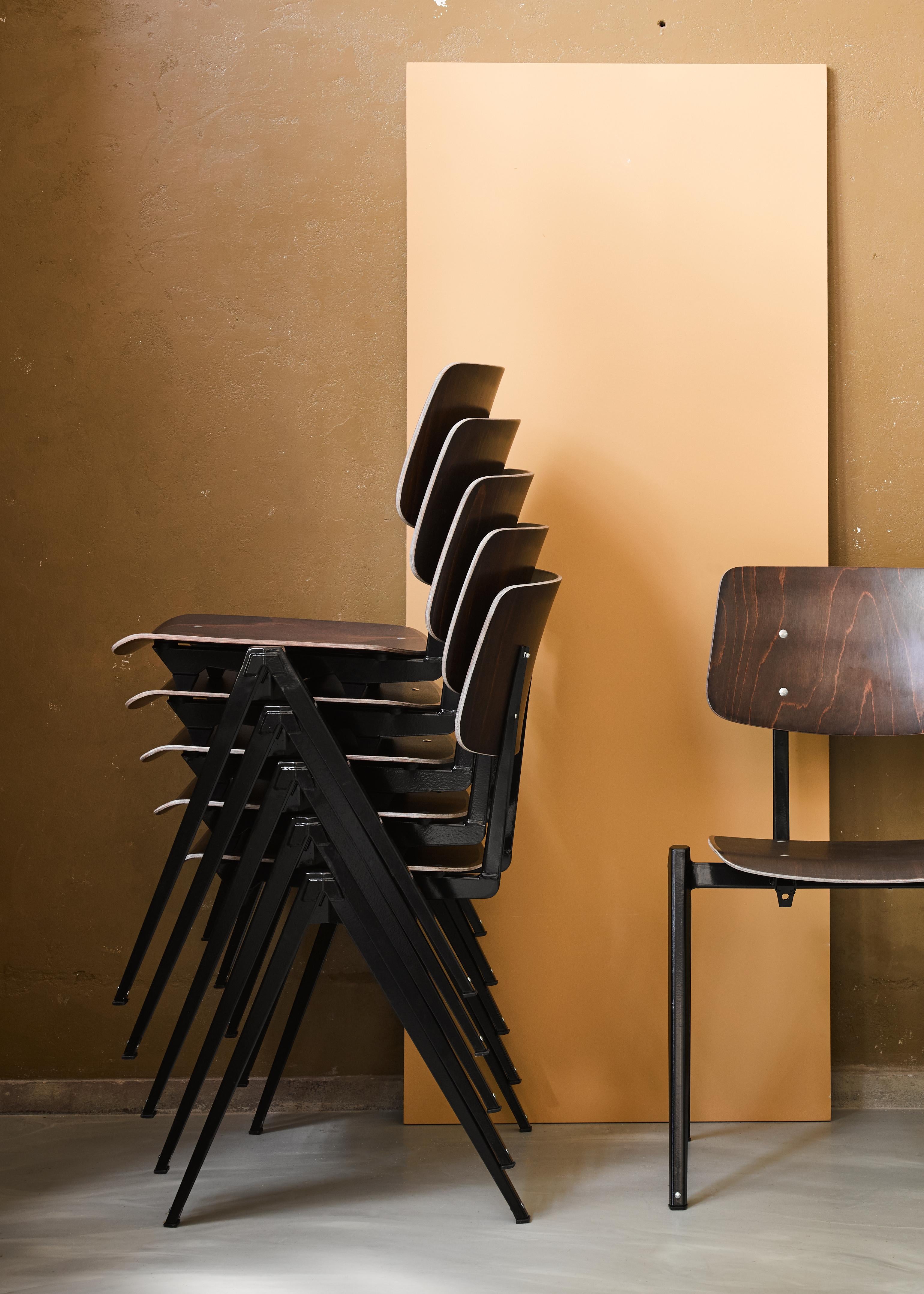Functional / Industrial Galvanitas S21 stackable plywood chairs in the style of Prouvé. Frames are made of folded sheet steel and seat / backpanel of resin plywood. Stackable with a maximum of 6 chairs. Various colors, quantities and bespoke service
