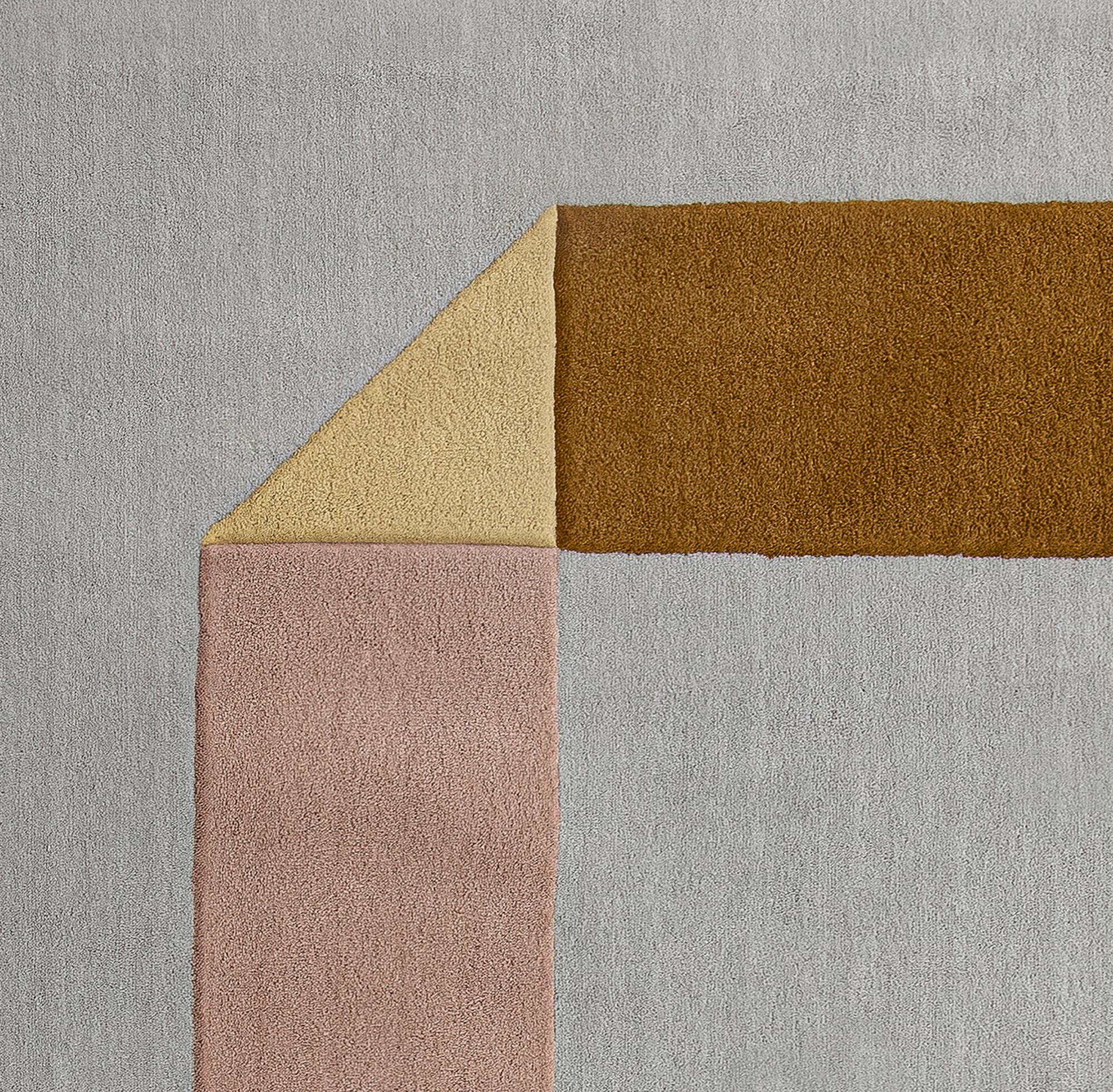 rug de la collection géométrie des rencontres, qui traduit graphiquement la façon dont les rencontres changent nos vies. Tapis à hauteur variable, fabriqué à la main à partir de matériaux 100 % recyclables.