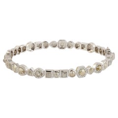 Bracelet tennis en or blanc 18 carats avec diamants glacés multiformes