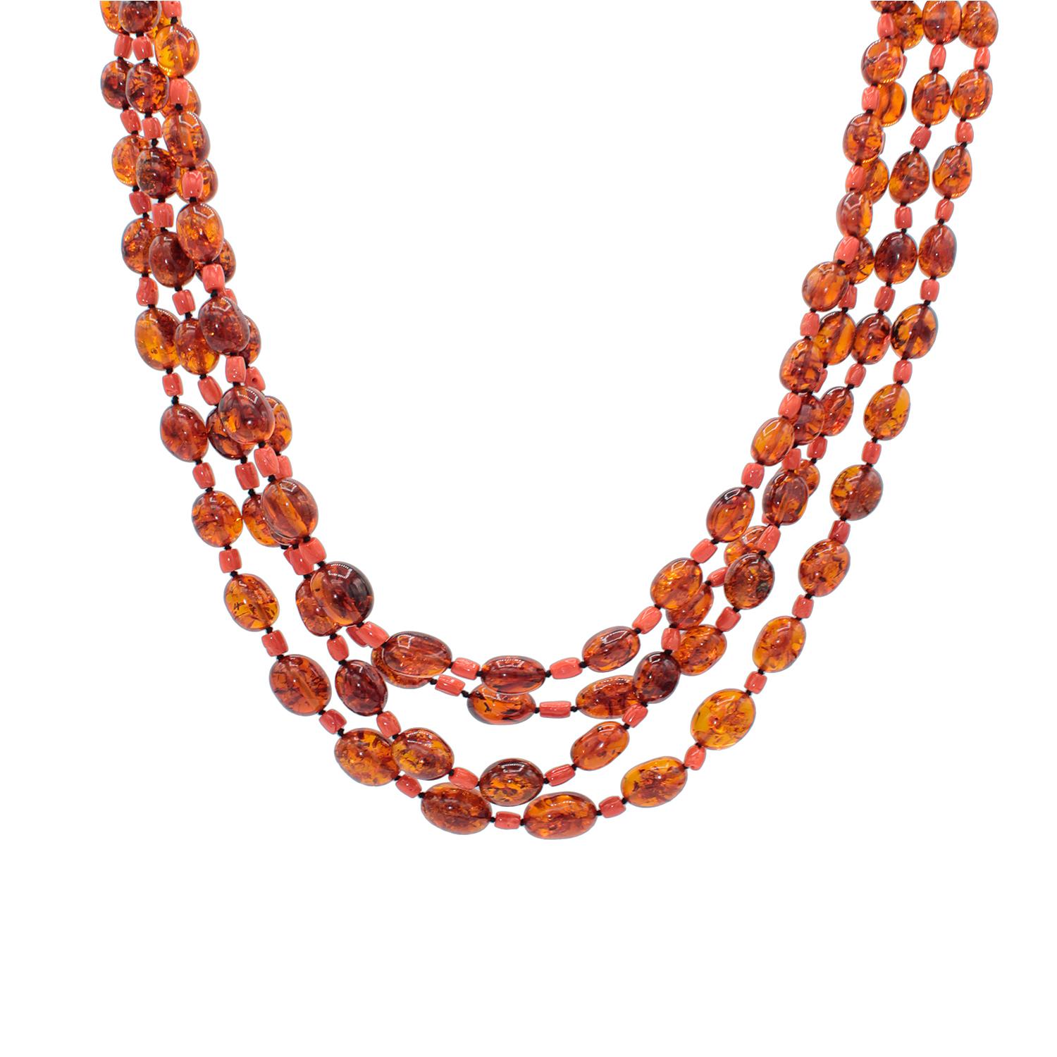 Multistrand necklace realized in natural amber, red coral and bakelite clasp
n. 4 graduated strands
Red Mediterranean Coral (Corallium rubrum)
Natural Baltic Amber
Bakelite clasp
Total lenght cm 44 ( including clasp) 
