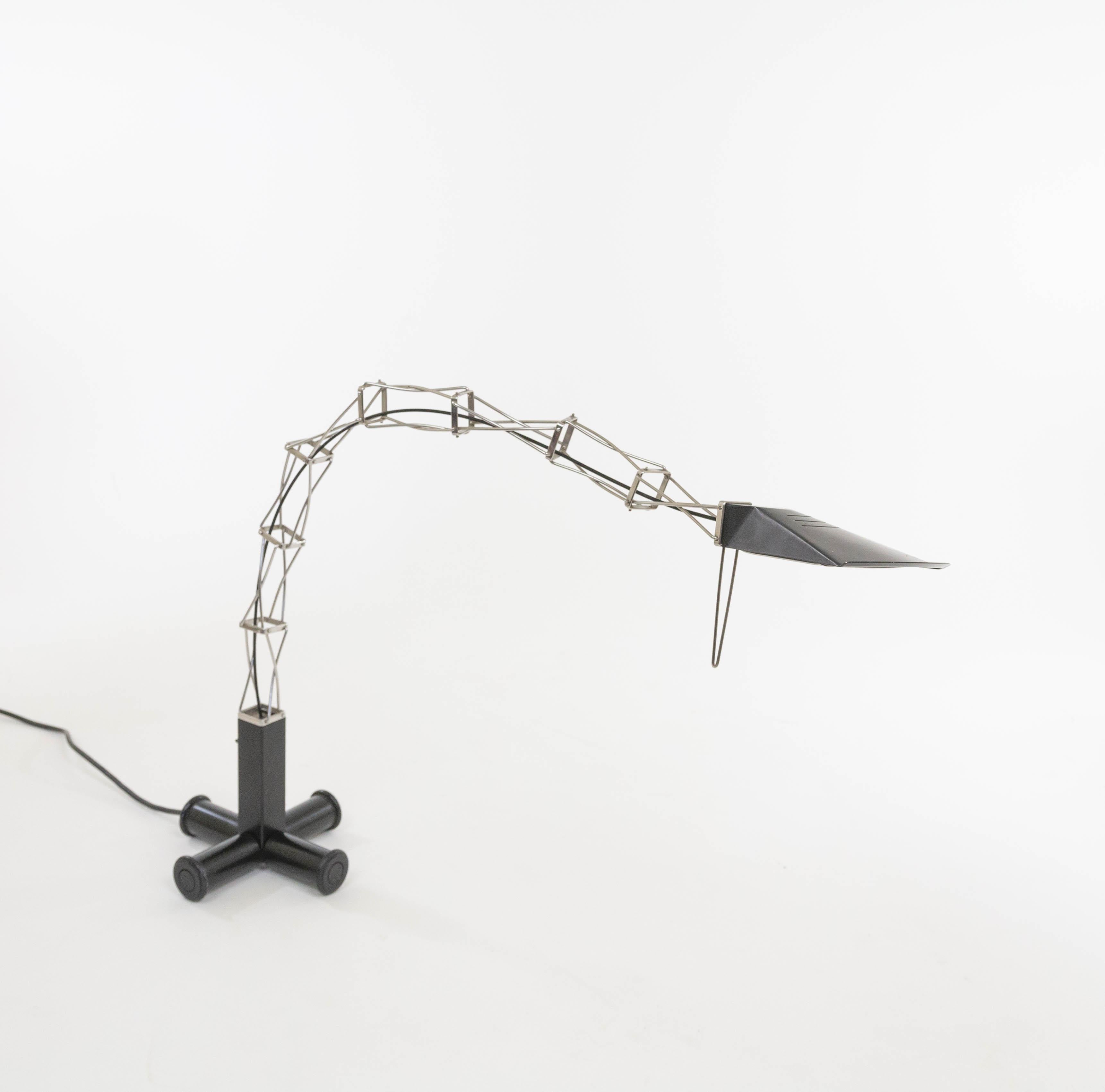 Multix halogen table lamp designed by Yaacov Kaufman for lighting manufacturer Lumina in the 1980s.

The base of the Multix table lamp consists of four round rotating tubes that end in wheels. The base makes it possible to easily turn the lamp in