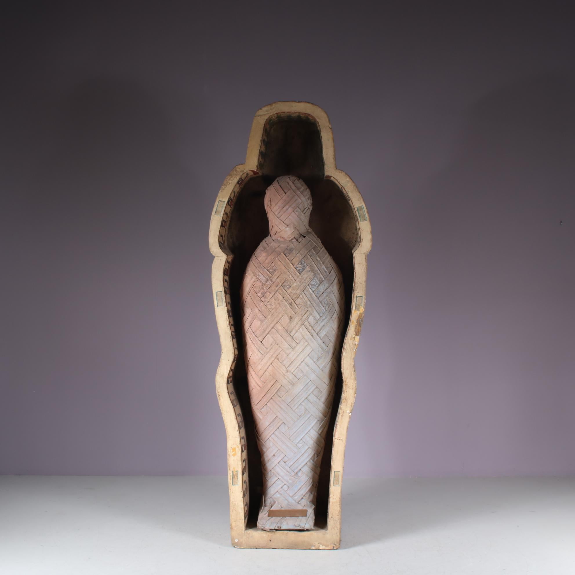 A one of a kind decorative mummy, originally made for Yves Saint Laurent in France in the 1990s.

This eye-catching piece is made of foam and synthetic materials and was used as a prop for a YSL fashion show. It is shapes as a mummy in an open