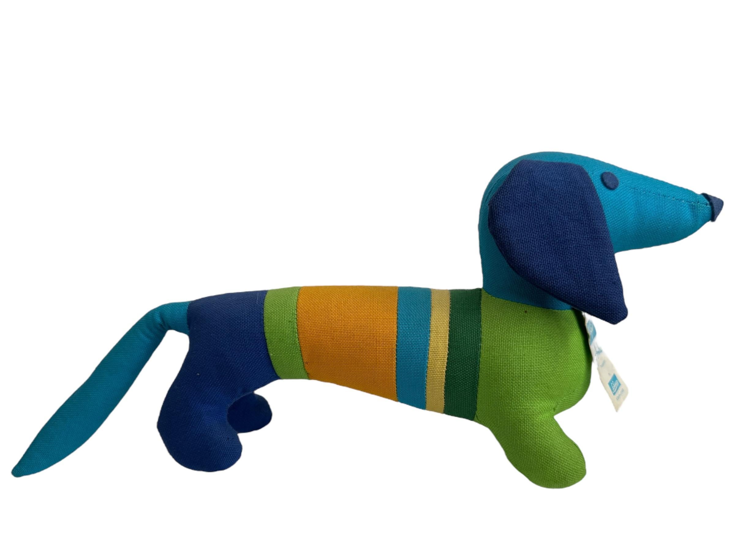 Original vintage German sport Mascot for the Summer Olympic Games 1972 held in Munich Germany, Waldi the Dachshund mascot dog. Nice addition to any collection. Marked on the Cardboard label, made in Germany by Hegi, Anker, a Schuco Company. Found at