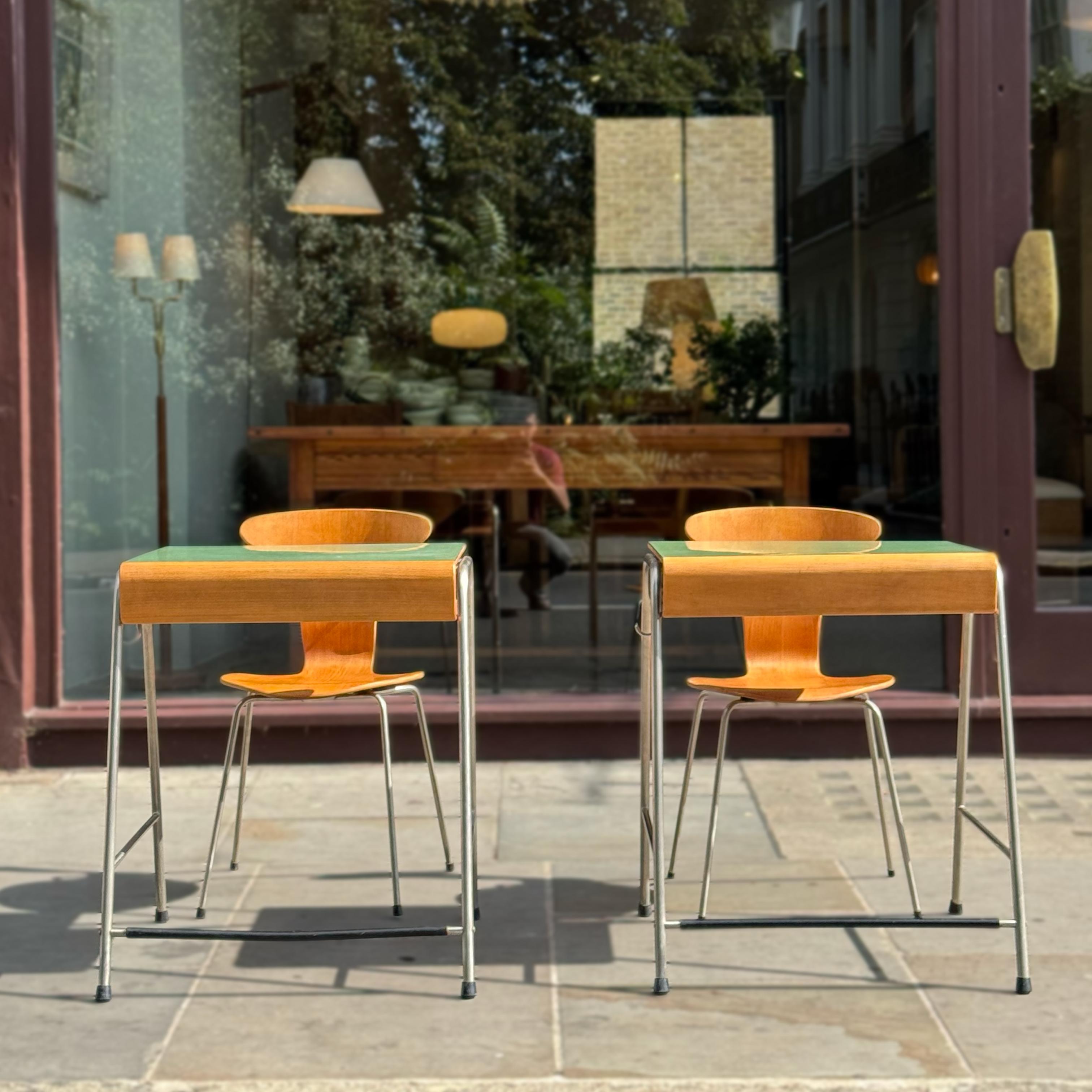 Description: 

School desks and chairs designed for the Munkegaard School by Danish architect and designer, Arne Jacobsen during the mid-late 1950s. The Munkegaard School opened in 1957. It was a large, single-story building in which the