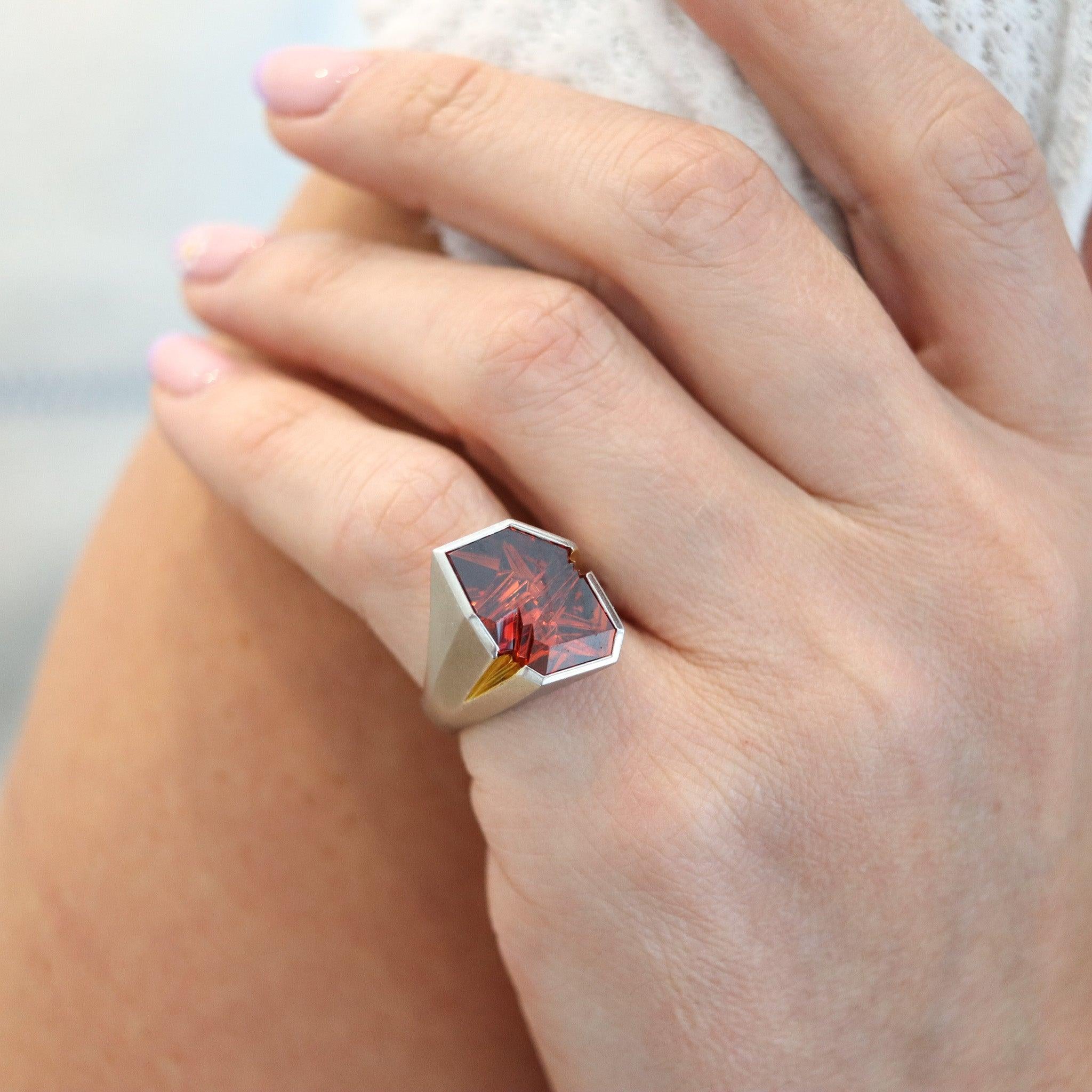 Geometric sculptural ring designed by Atelier Munsteiner.

This is a fabulous geometric cocktail ring, created in Germany with modernist patterns back in the 1980. The sculptural ring was carefully crafted with five sides in solid .950/.999 platinum