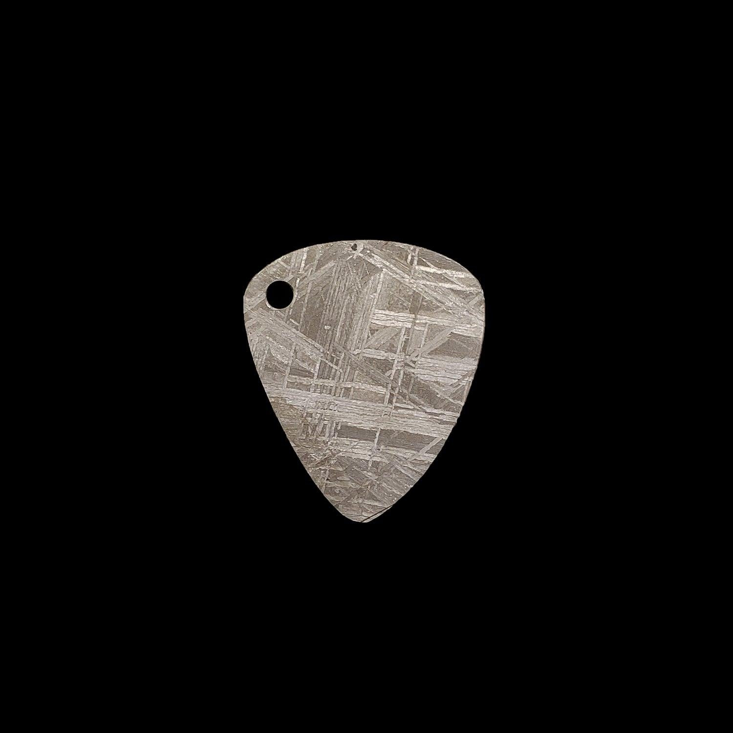 Sweden

This unique functional guitar pick fashioned from Muonionalusta meteorite can make a lovely necklace with the addition of a thin cord or silver chain. A fantastic gift for yourself or a loved one. Make the music you play truly