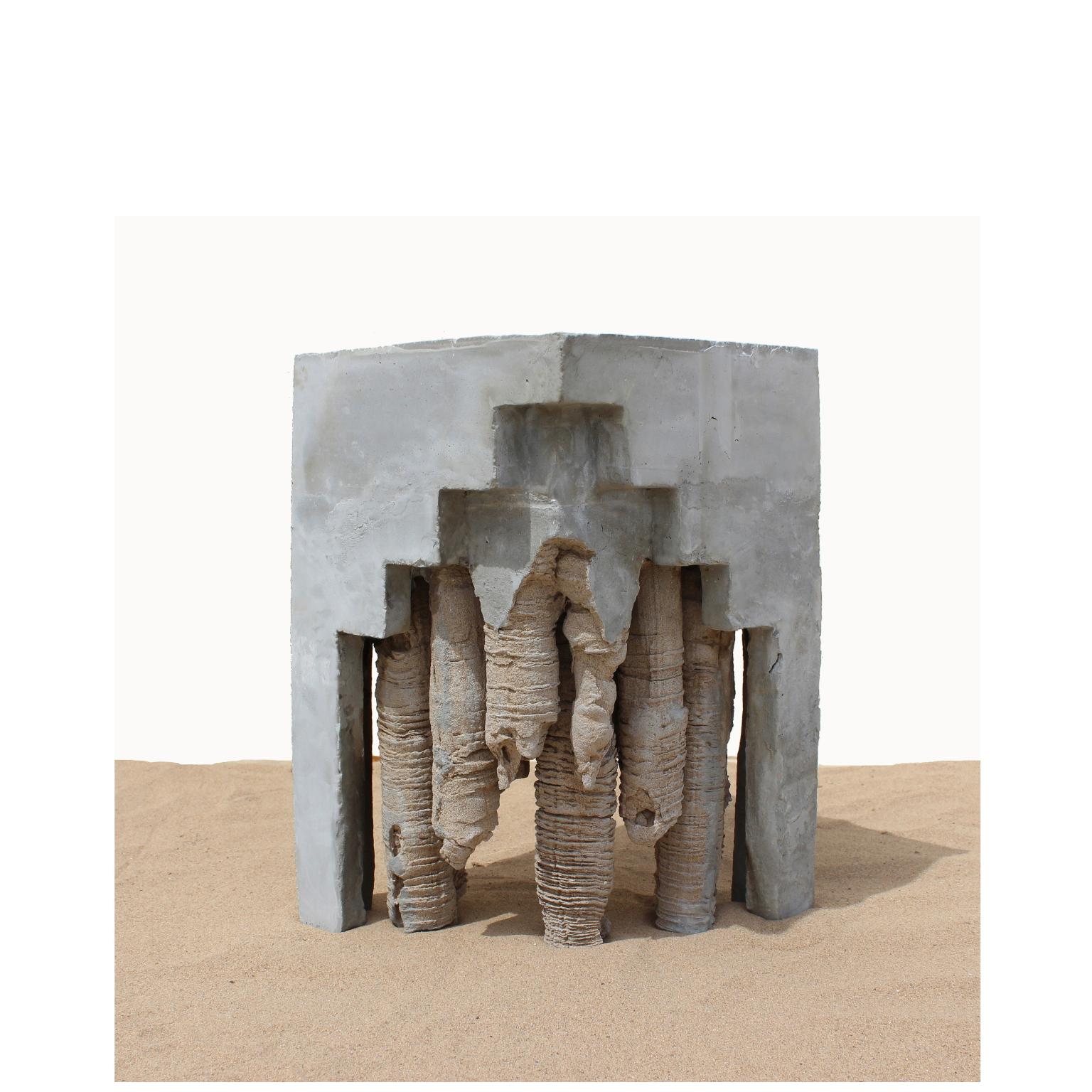 Geomorphic vase by Christian Zahr
Dimensions: W 25 x D 25 x H 50 cm
Materials: Cement- Sand- Water- Time.

Each piece is handmade.

The “Muqarnas” side table, as it’s name indicates, replicates the muqarnas, a powerful sculptural element in
