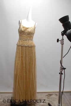 MURAD ZUHAIR, Vestido de noche de lentejuelas y pedrería dorado metalizado hasta el suelo