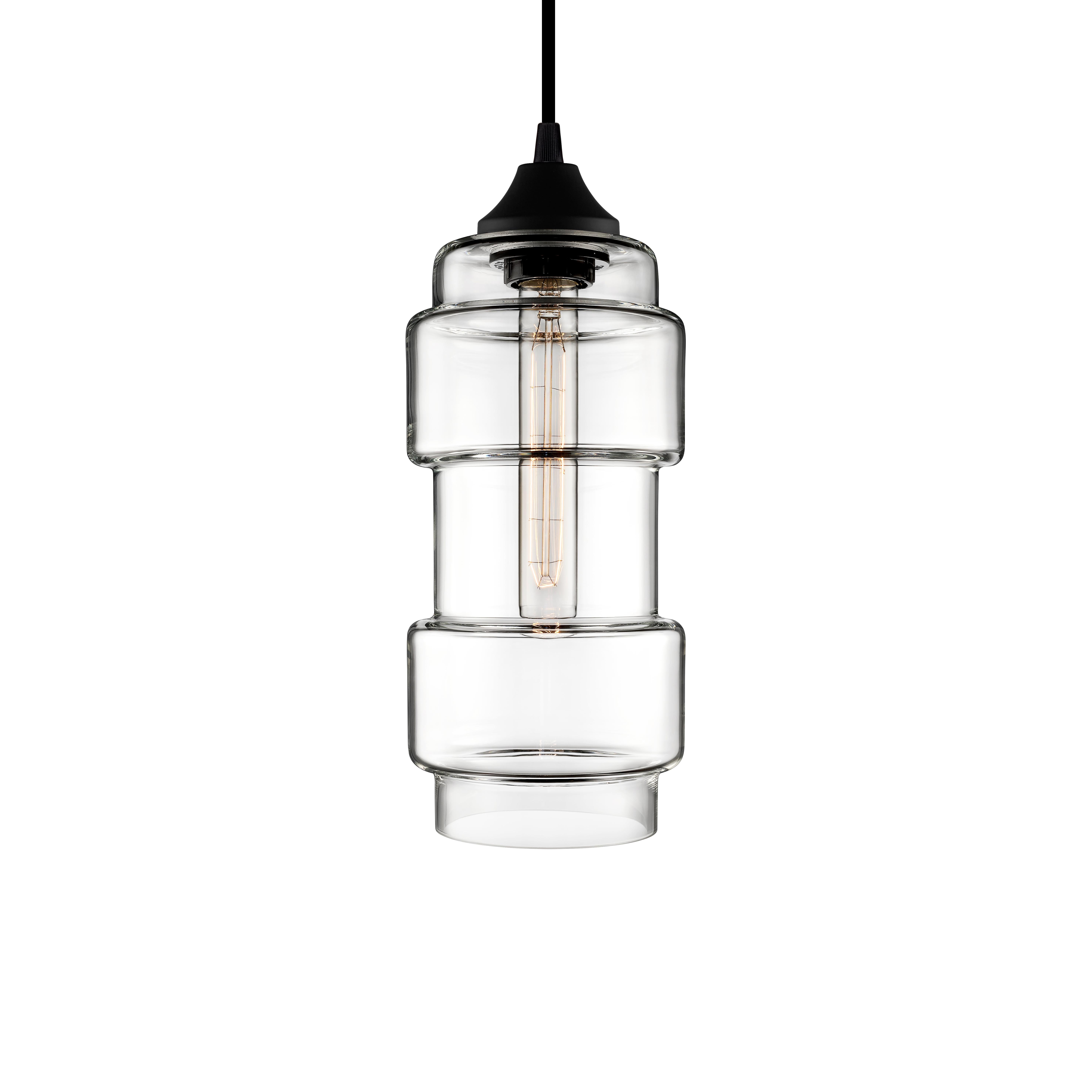 Inspired by ancient castle walls, the defined edges and slender build of the Muralla pendant enhance any setting. Every single glass pendant light that comes from Niche is handblown by real human beings in a state-of-the-art studio located in