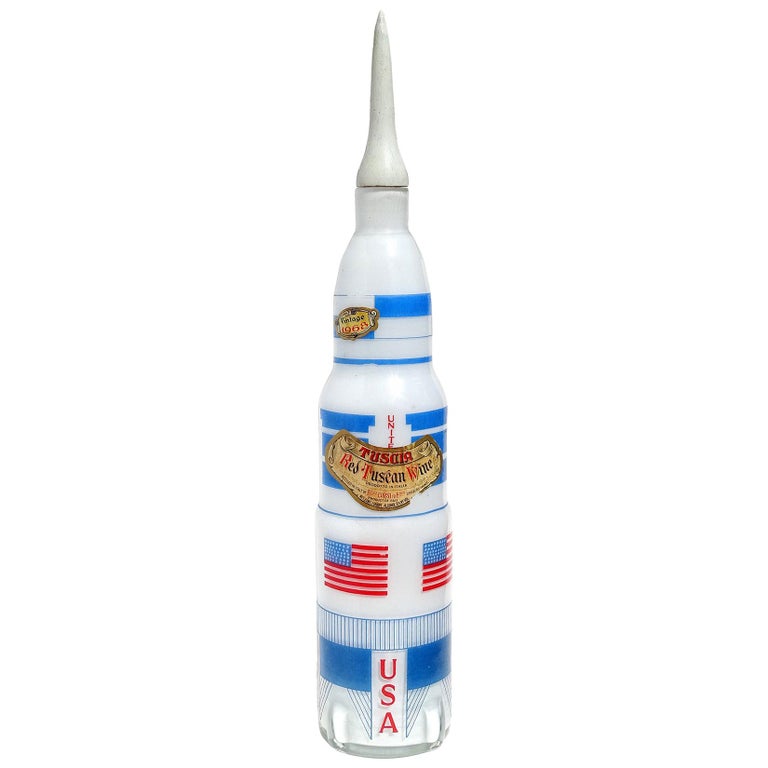 Unusual large vintage Murano hand painted, opal white Italian art glass rocket shaped liquor decanter. Looks to have been created in commemoration of the 1968 NASA Apollo Mission. The piece has multiple labels still attached (see below for
