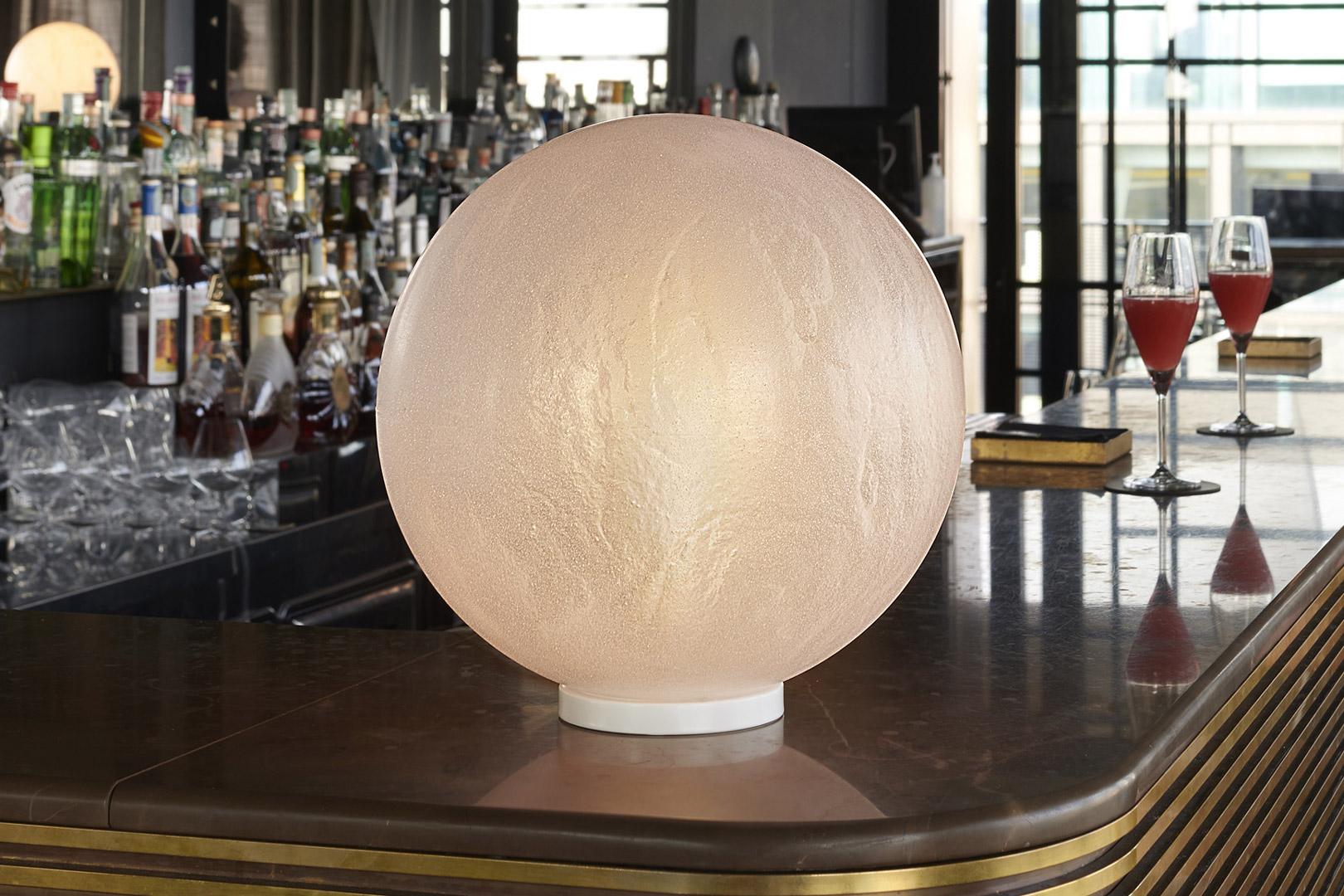 Murano 40 Table Lamp by SLIDE Studio
Dimensions: Ø 40 x H 41 cm.
Materials: Styrene acrylonitrile and metal.

This product is suitable for indoor and outdoor use. All our lamps can be wired according to each country. If sold to the USA it will be