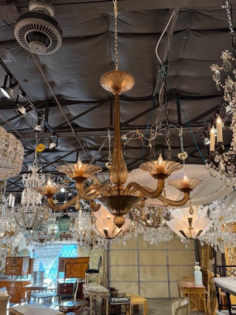 Vintage Murano tobacco glass 6-light chandelier. Circa 1970. The chandelier has been professionally rewired, comes with matching chain and canopy. It is ready to hang!