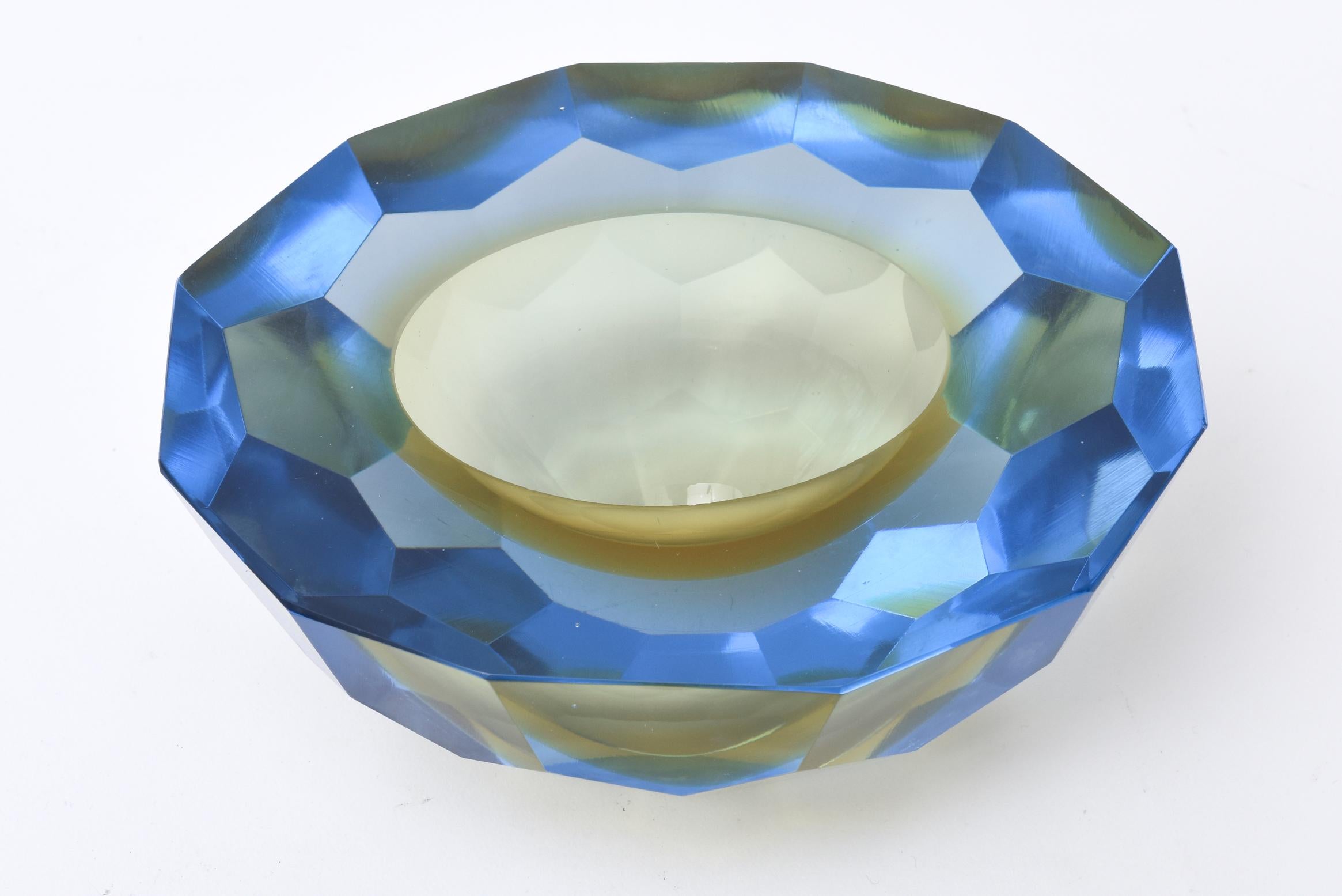 This gorgeous gem of an Italian hand blown Murano bowl by Alessandro Mandruzzato is diamond faceted surround in Sommerso colors in geode form. The flat top os polished and the shape is oval. These are sometimes called caviar bowls for serving the