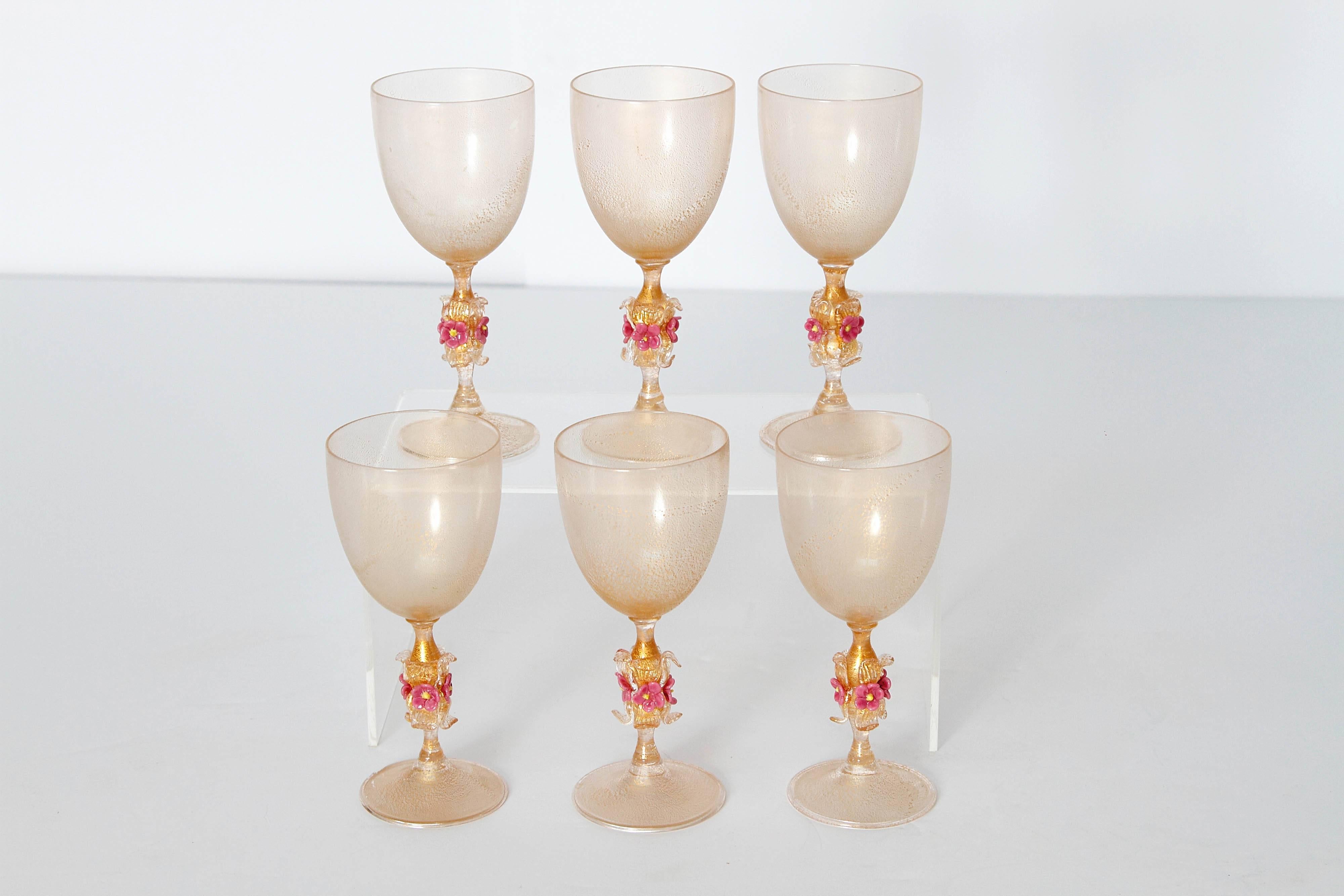 A set of six Murano amber glass wine goblets with gold flecks and floral decoration on stems, Italy 

vintage mouth-blown Venetian glass / stemware.