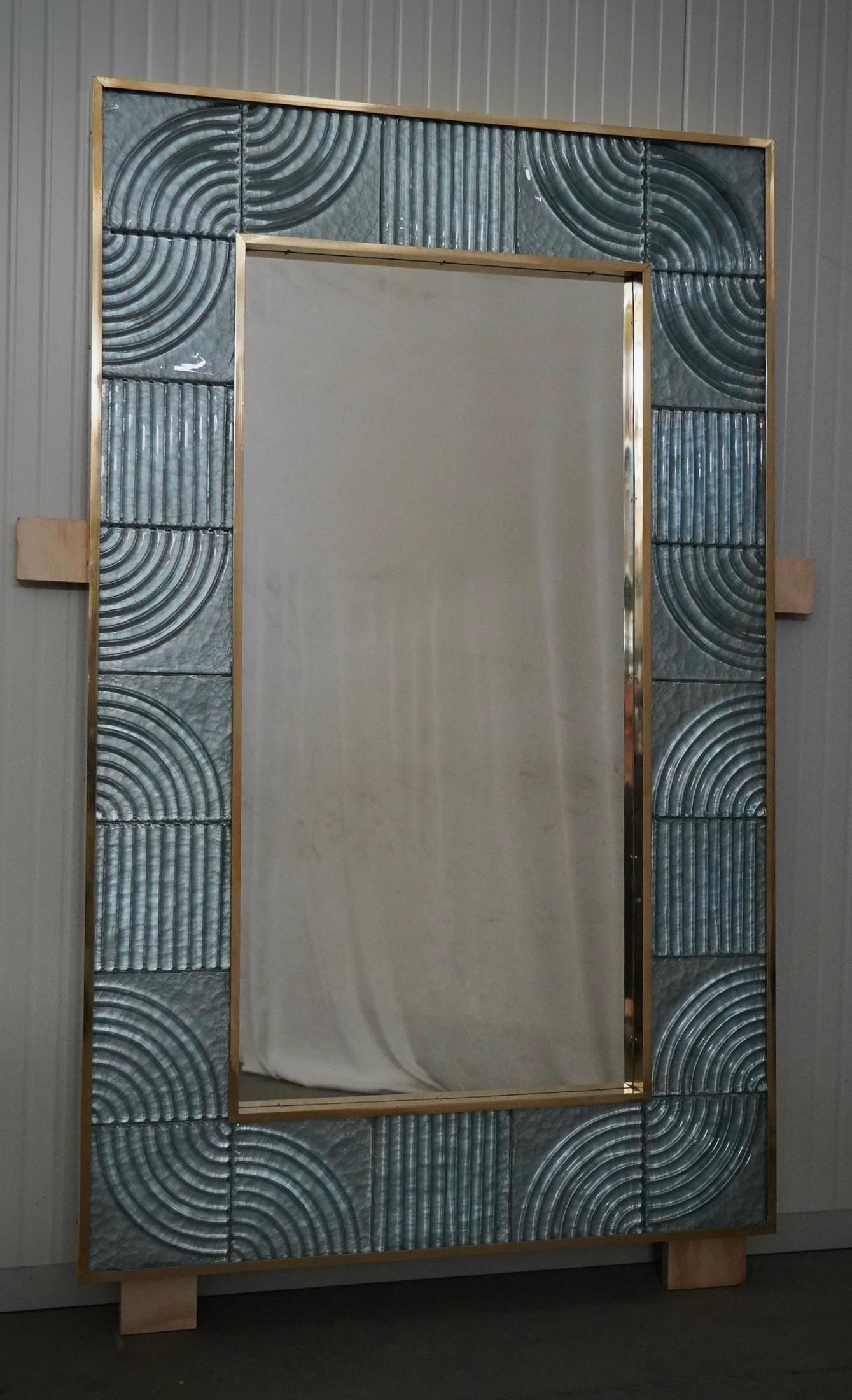A sturdy aqua blue frame captures the gaze of those who observe it, leaving them in ecstasy. The Murano furnaces create an indisputable and timeless design, simple but elegant at the same time.

The structure of the wall mirror is made of wood,