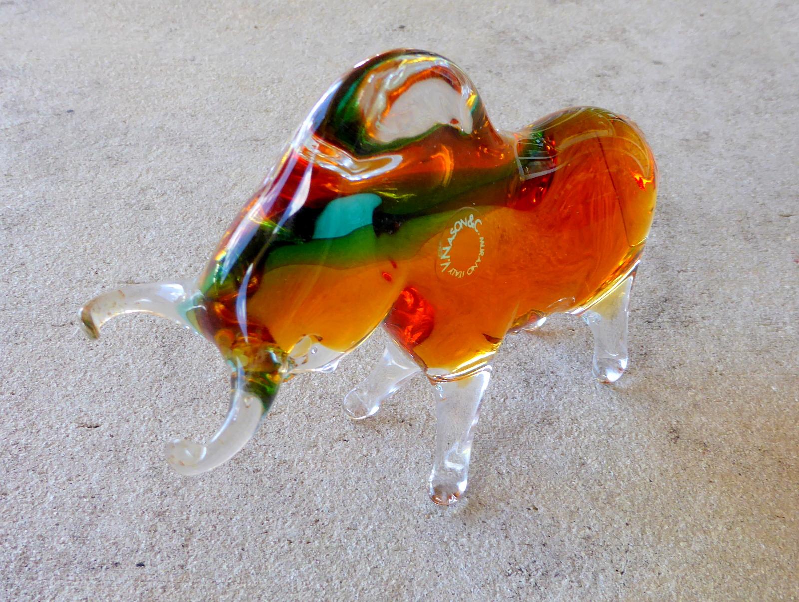 A lovely sommerso bull figurine in blue and amber encased in clear glass. Designed by Vincenzo Nason in the islands of Murano, Italy.

A few important notes about all items available through this 1stdibs dealer:

1. We list all our items as being in