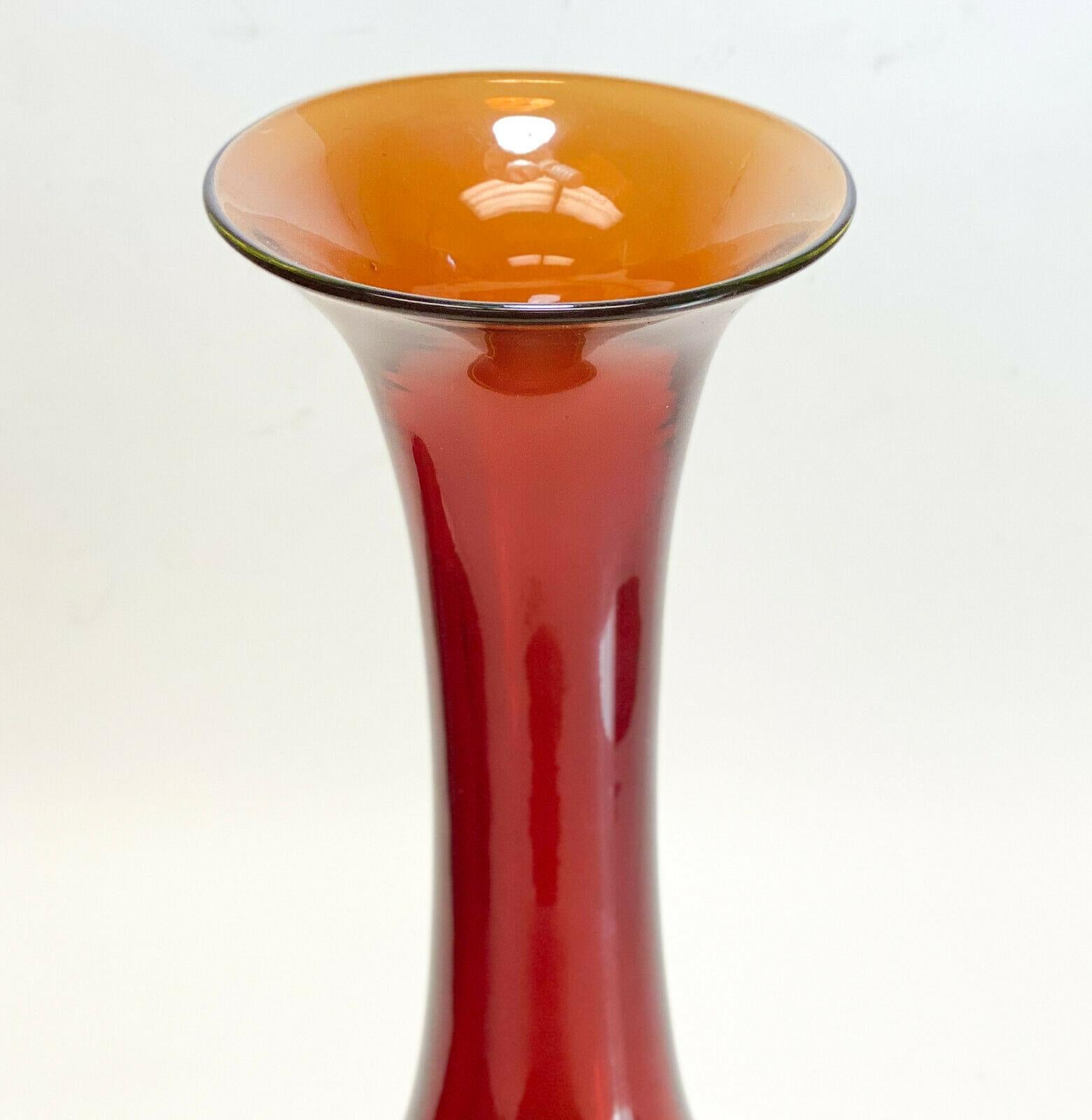 Murano Art glass Carolla vase by Antonio da Ros sommerso for Vetreria Gino Cenedese, 1964. Multicolored with red along the stem and lime green to the base. The original paper label no longer accompanies the vase.

Weight approximate, 12