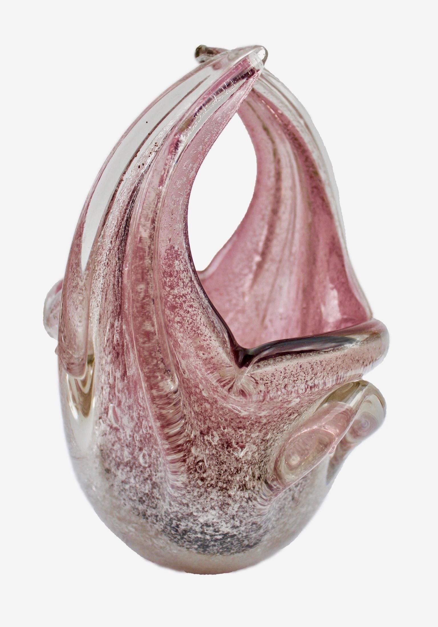 A stunning piece of art! The shape and the colour are fantastic. 
Handblown glass. 
Excellent condition. 
Elegant large Murano handblown pink opalescent and silver flecks art glass cornucopia flower basket.
In style of Archimede Seguso

This