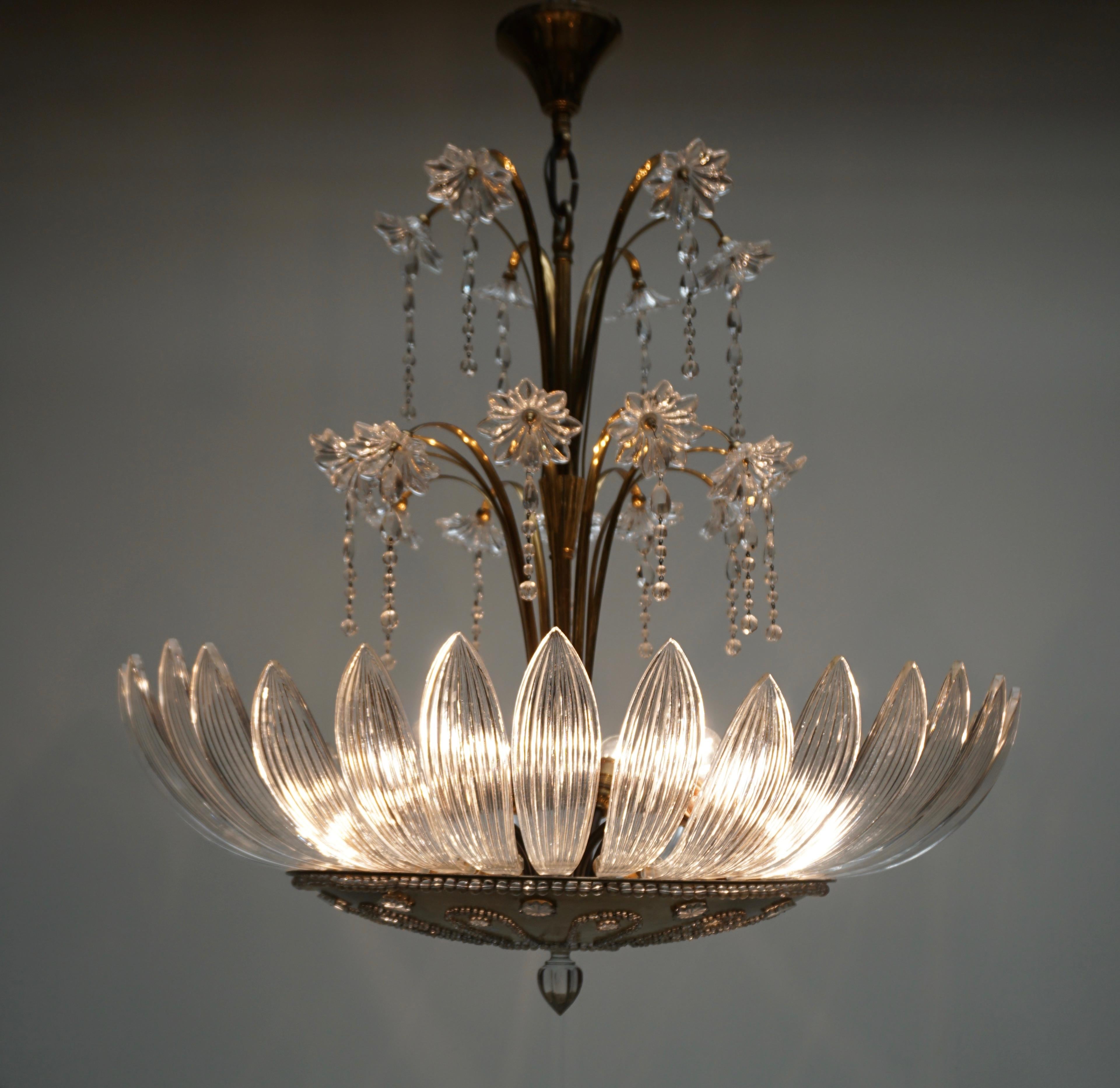 Gorgeous Italian midcentury Murano glass chandelier with hand blown glass. 
Measures:
Diameter 78 cm 
Height fixture 70 cm
Total height with canopy 90 cm
Ten E27 light bulbs / Good working condition/European wiring.