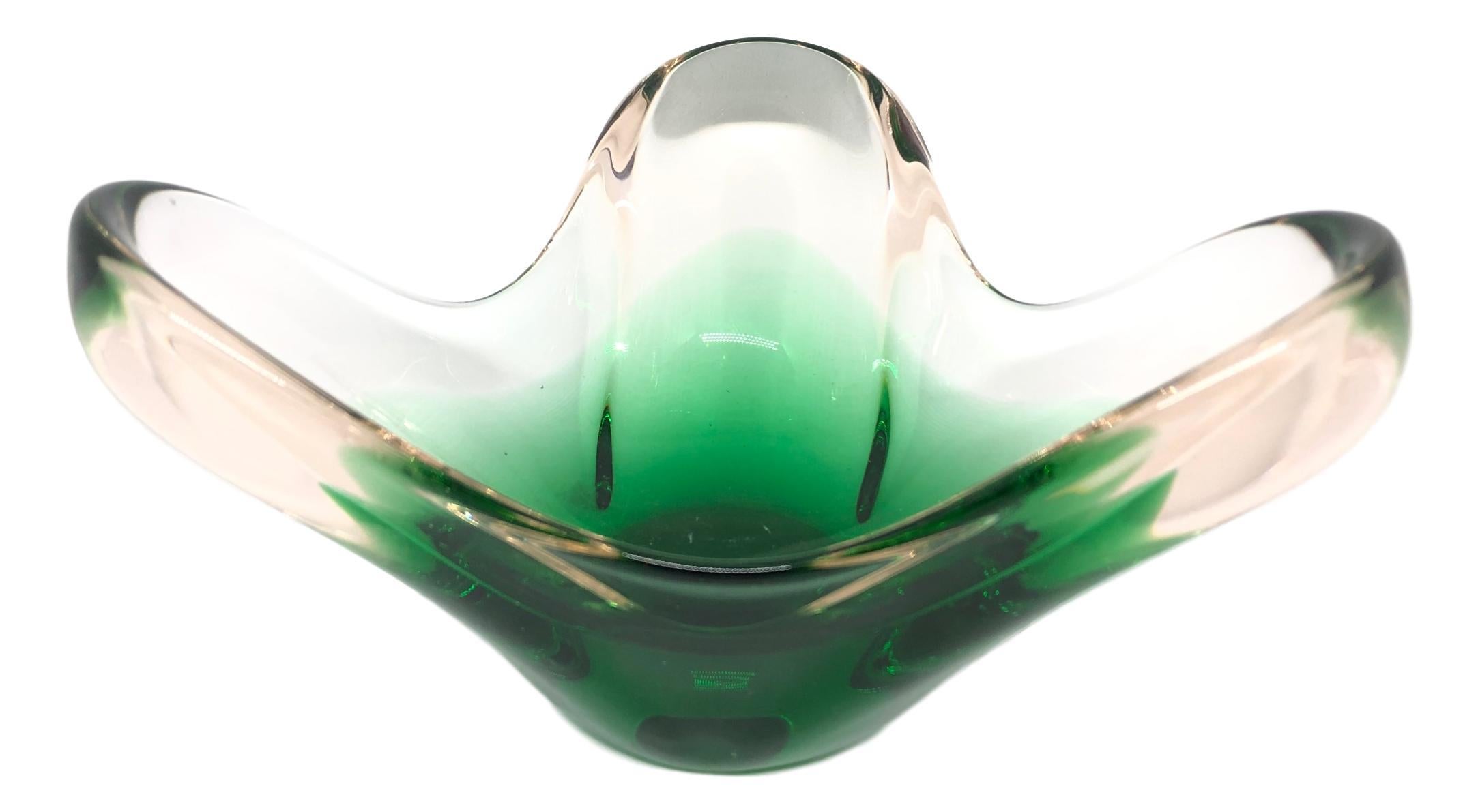 An amazing Venetian Murano glass object in an unusual design and a pretty beautiful green and clear color. A highly decorative piece useful as center piece, bowl, candy bowl or catchall. Italy, 1960s.