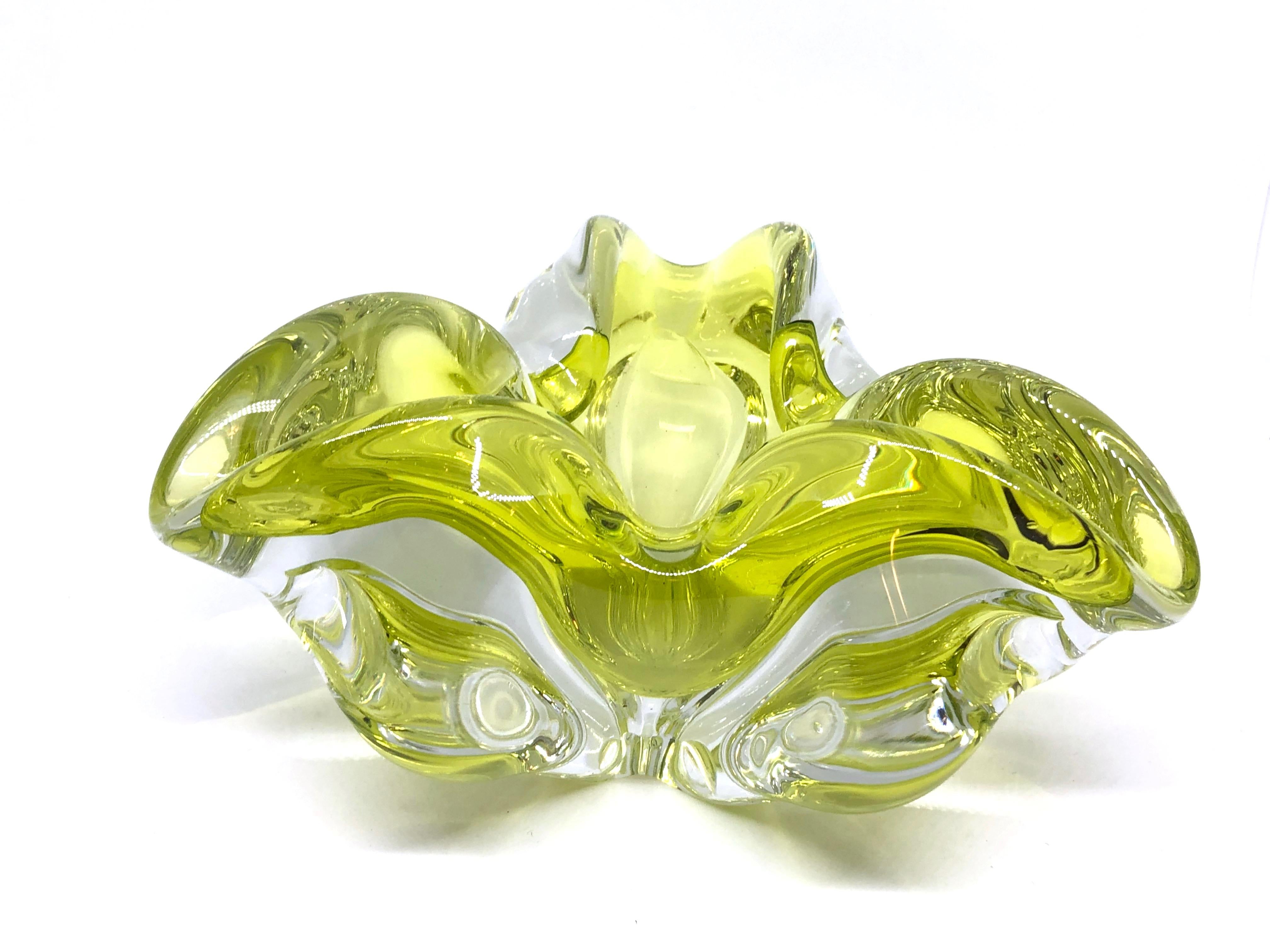 An amazing Venetian Murano glass object in an unusual design and a pretty beautiful lime green and clear color. A highly decorative piece useful as center piece, bowl, candy bowl or catchall, Italy, 1970s.