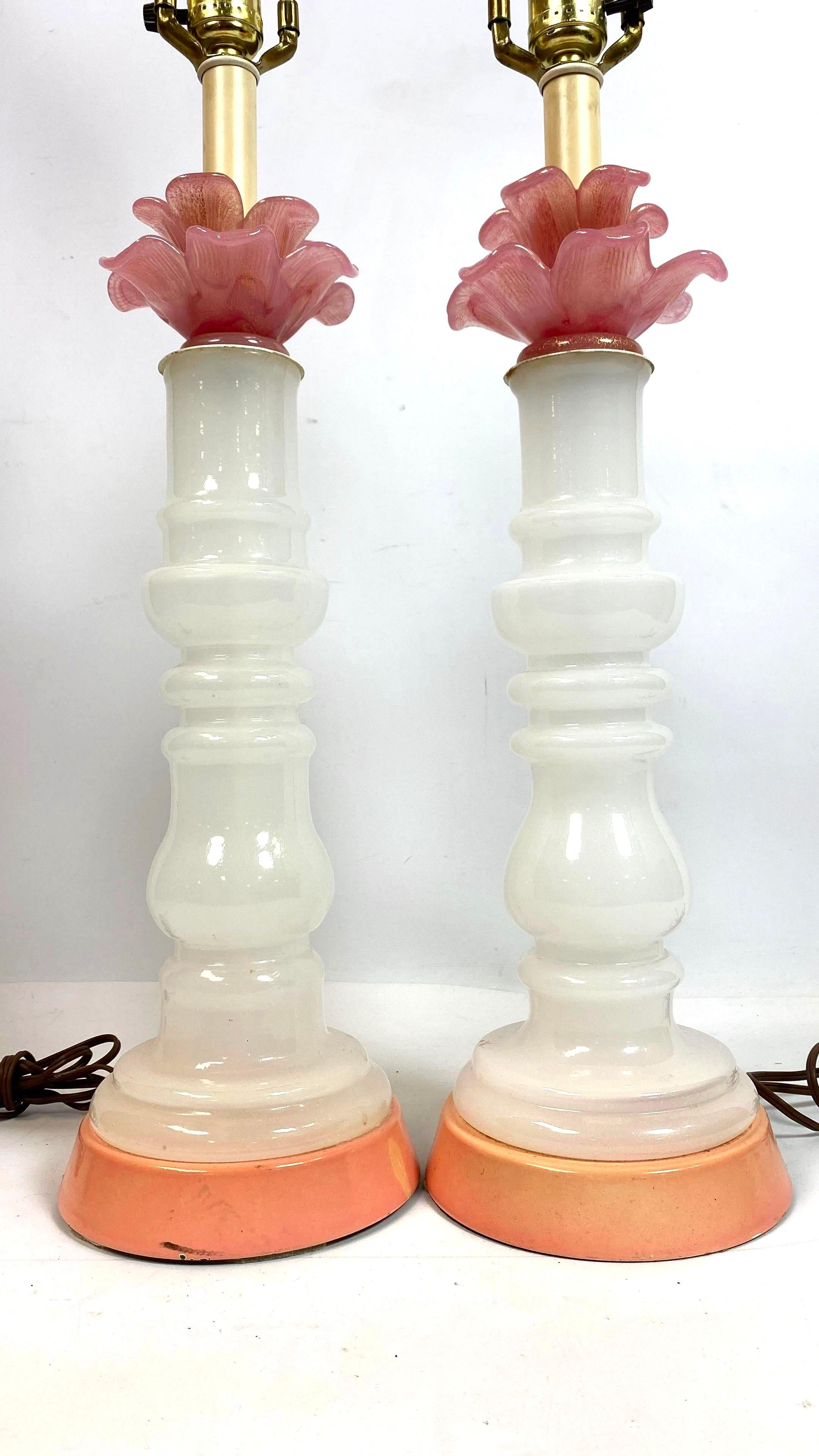Murano art glass modern floral columnar pink and white milk glass table lamps. Lovely peach ceramic base. Milk glass shaft and Murano art glass pink floral top. Shades for display only. Not included. Sold as a pair.