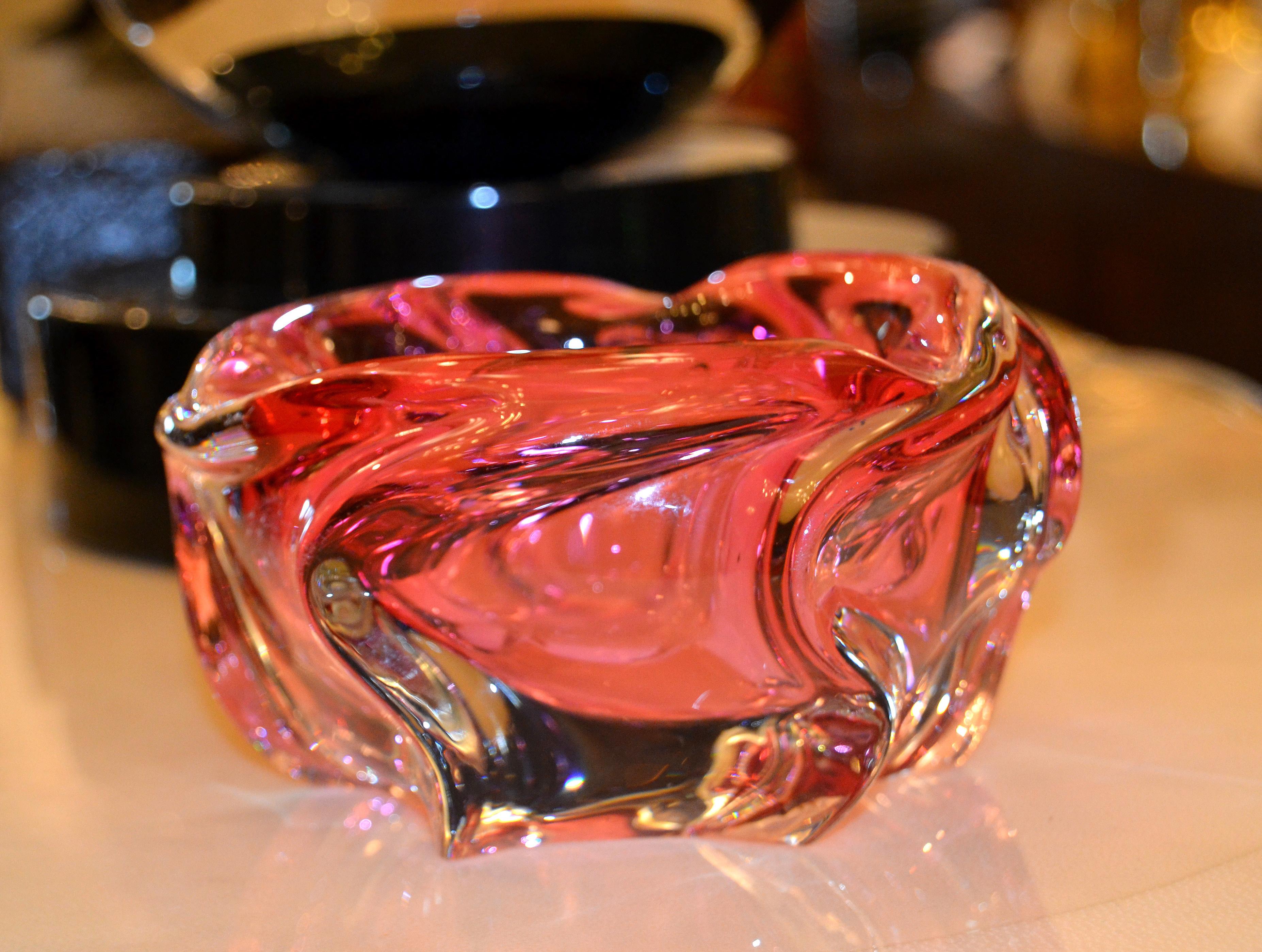 Pink and clear blown Murano art glass catchall, bowl or ashtray made in Italy.
Heavy clear blown glass with pink details.