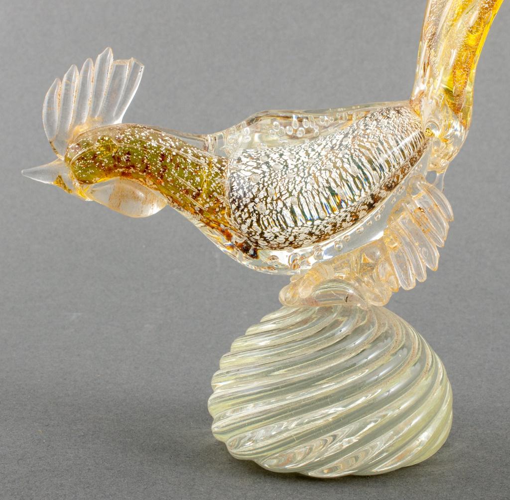 Murano Art Glass statue sculpture depicting a rooster bird in yellow glass encased in clear glass with silver flecks, apparently unsigned. 

Dealer: S138XX