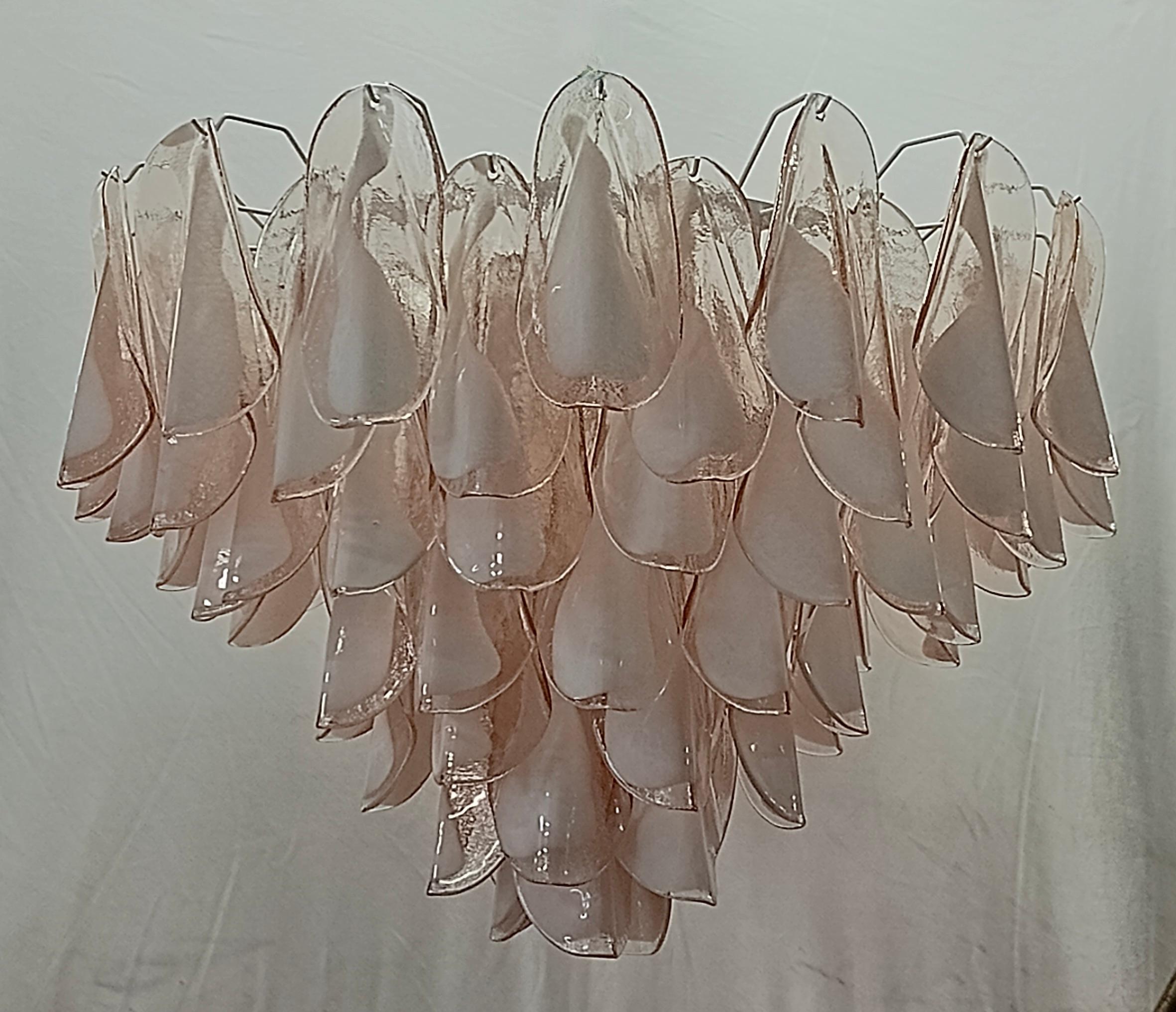 Fantastic Venetian light pink and white color for a Cascade of Murano leaves. A striking color for this chandelier.

All in Murano art glass with light pink leaves placed all around. The color of this very Classic Murano chandelier is very light