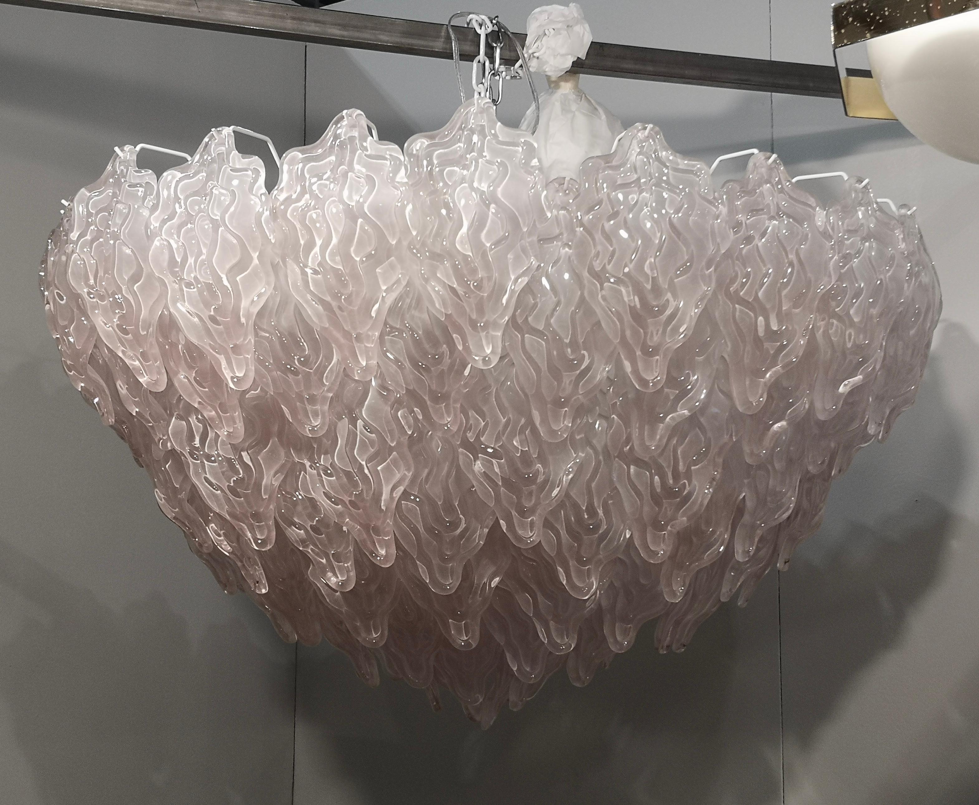 Fantastic Venetian light pink color for a Cascade of Murano leaves. A striking color for this chandelier.

All in Murano art glass with light pink leaves placed all around. The color of this very Classic Murano chandelier is very light pink. Its