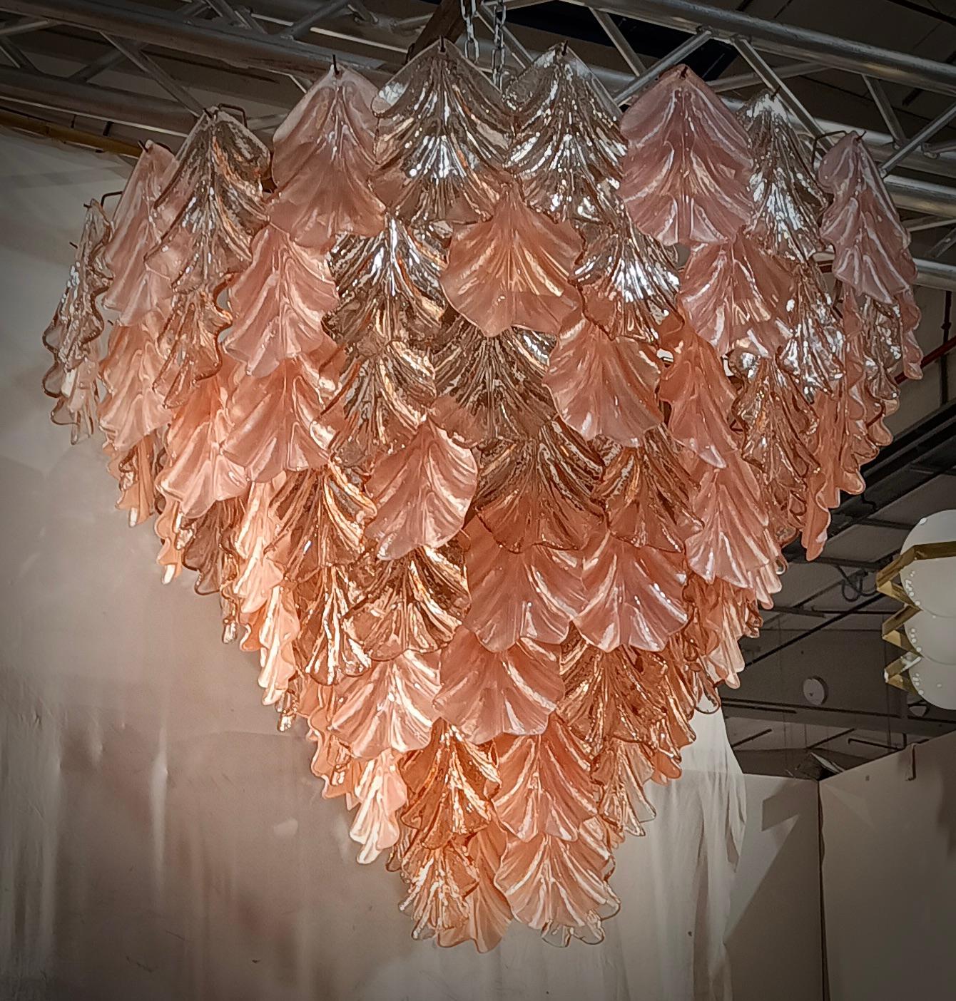 Fantastic Venetian pink color for a Cascade of Murano leaves. A striking color for this chandelier.

All in Murano art glass with pink leaves placed all around. The color of this very special Murano chandelier is very bright pink. Its construction