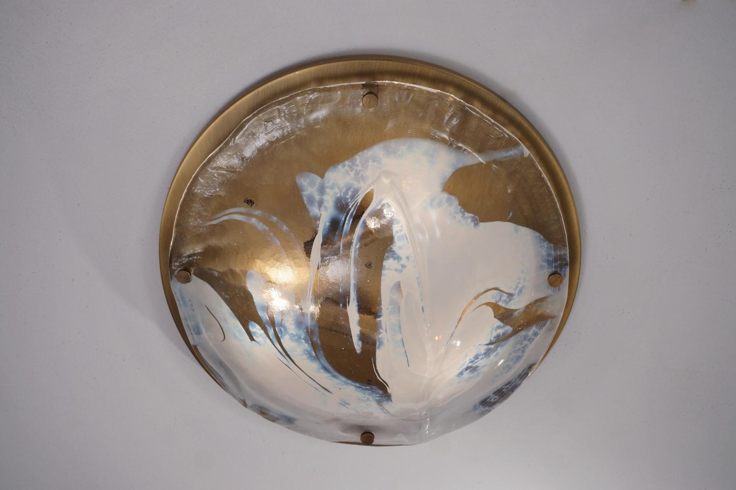 Murano art glass large flush light with a solid brass base by Hillebrand Lighting, circa 1970s German. The solid brass base is finished with an elegant satin effect.

Thoroughly cleaned respecting the vintage patina. Newly rewired, earthed, in