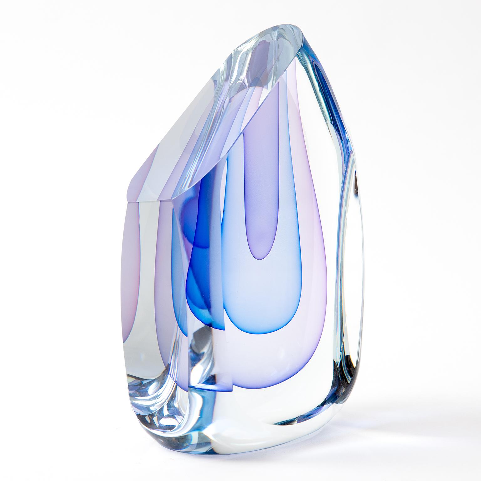 Wow! This stunning Sommerso solid art glass sculpture has subtle alternating layers of pale blue and shades of lavender.
Makes a great gift!