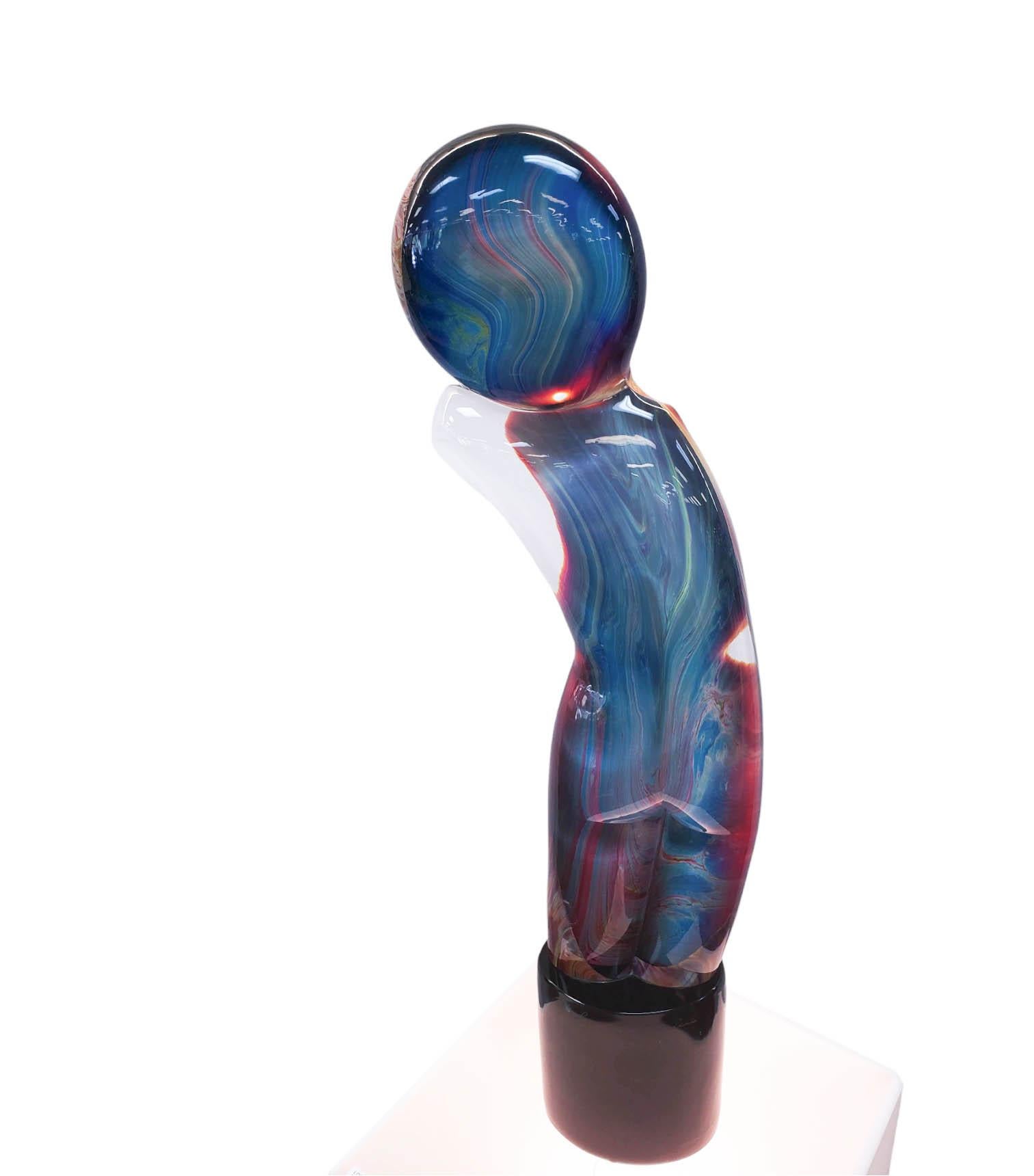Art glass sculpture by Loredano Rosin (Italian, 1936-1991) portrays a nude figure in hand-polished Calcedonia glass on a base signed by the artist. CIRCA: 1991. The sculpture sits atop a pedestal that can be lit.

DIMENSIONS: sculpture: 31 inches