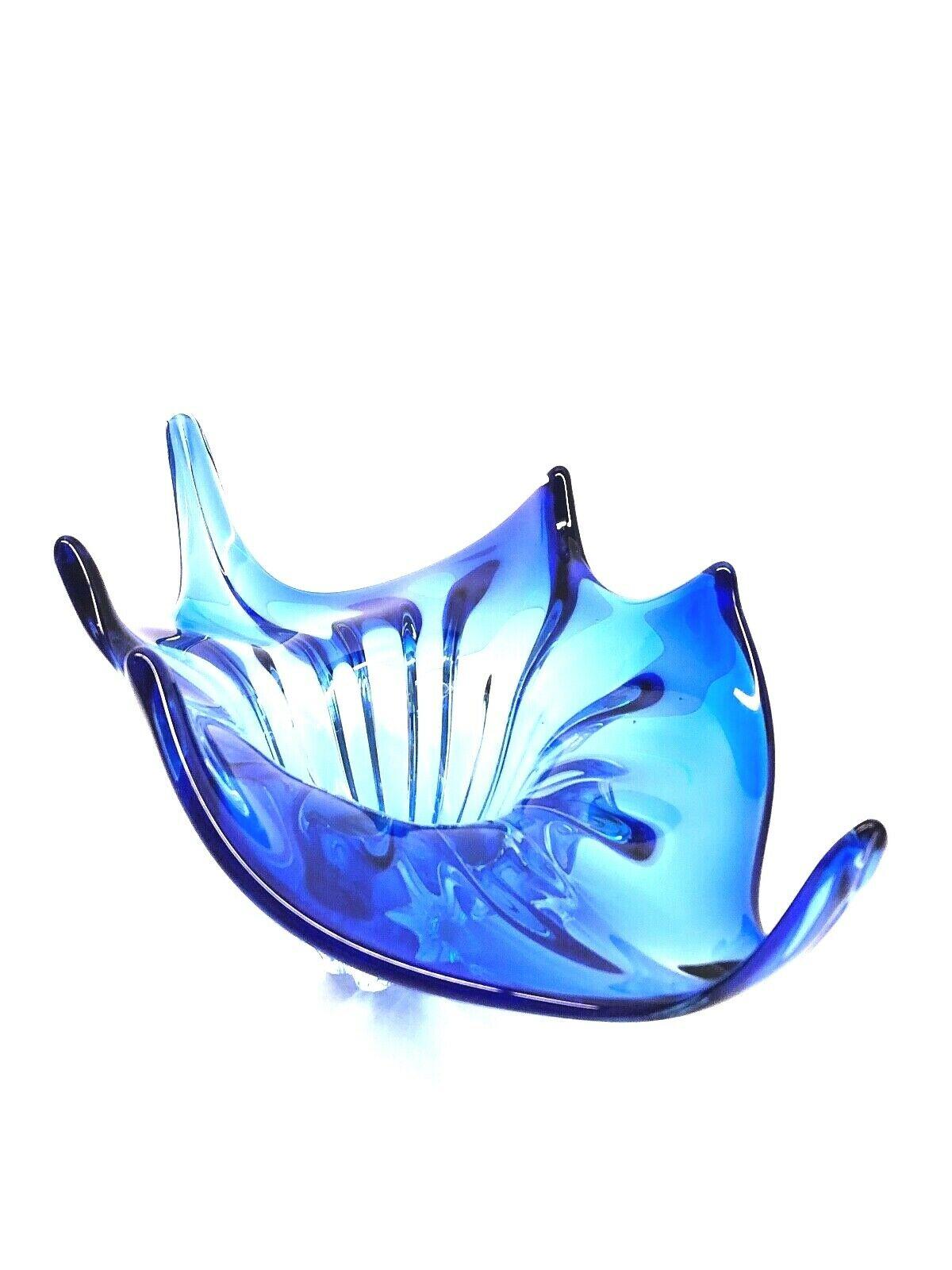 An amazing Venetian Murano glass bowl in a nice royal blue and clear color. A highly decorative piece useful as centre piece or bowl, candy bowl or fruit bowl, Italy, 1970s.