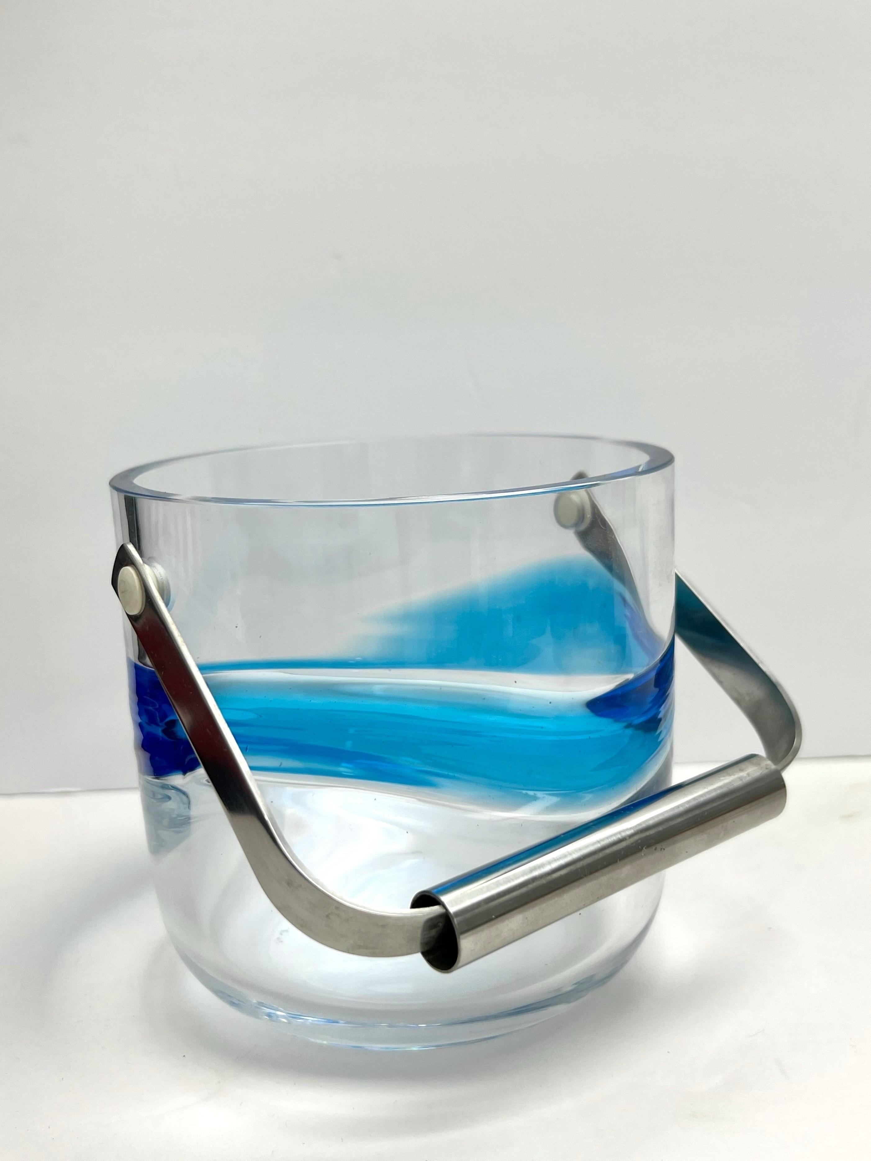 A beautiful petit ice bucket . Murano glass with stainless steel handle. Height of glass is 5”, total height is 8”