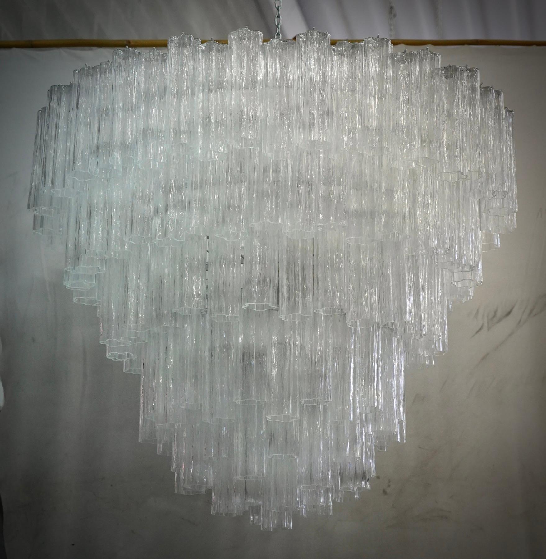 Extraordinary transparent color for this Murano chandelier, a light color with a unique transparency. its transparency color is really guessed for a different and original chandelier from others. A beautiful stain of color above your ceiling will