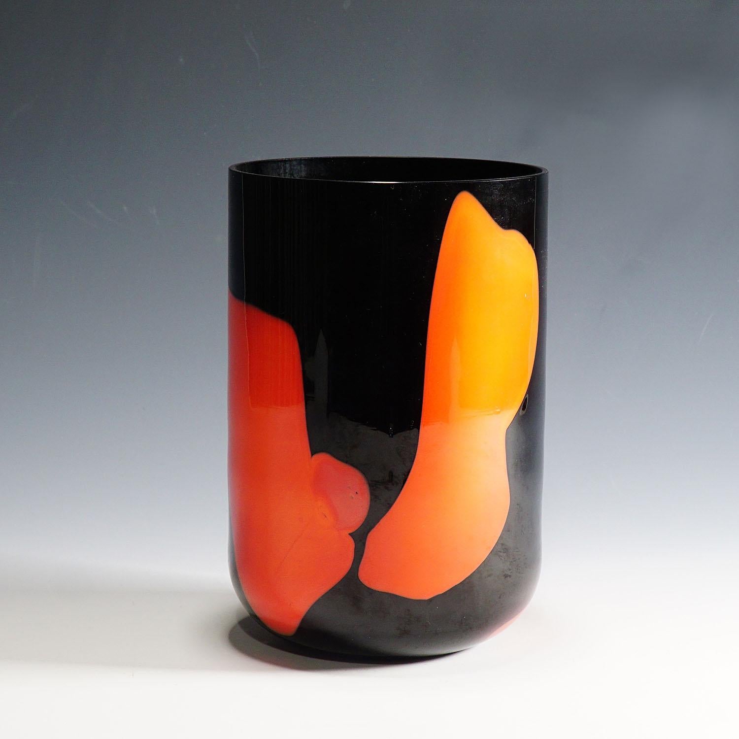 Murano Art Glass Vase 'Macchia' by V. Nason & C. ca. 1990s

A Murano art glass vase 'Macchia' from the 'Eklettika' collection of V. Nason & C. Designed by glassmaster Carlo Nason. Black glass overlayed with large red glass spots. Lable of the