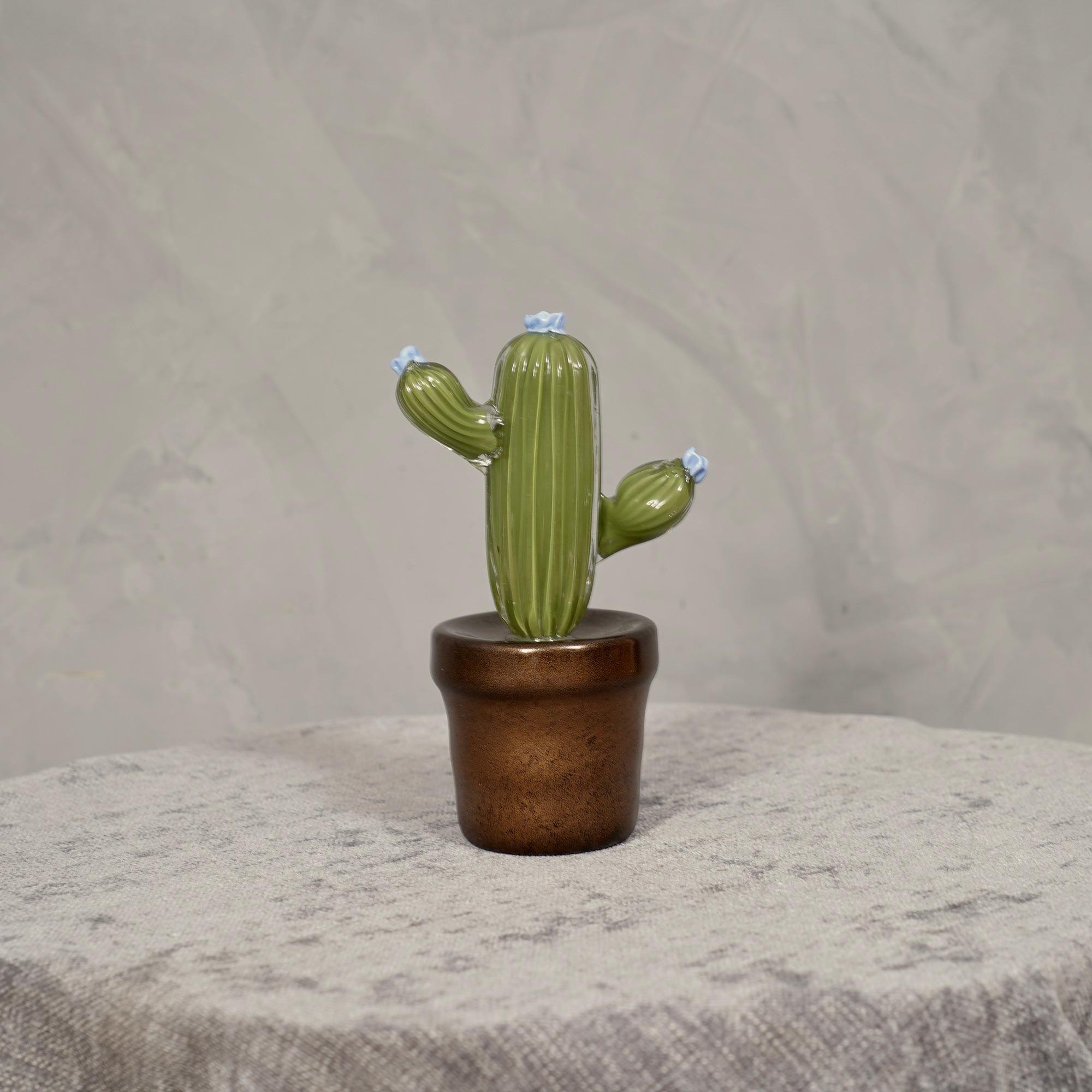 Italian design, this cactus is a fashion icon of the Italian style, olive green with a beautiful green glass vase underneath.

In limited edition, manufactured in one of the furnaces in Venice, the cacti are in Murano glass have a vase in green