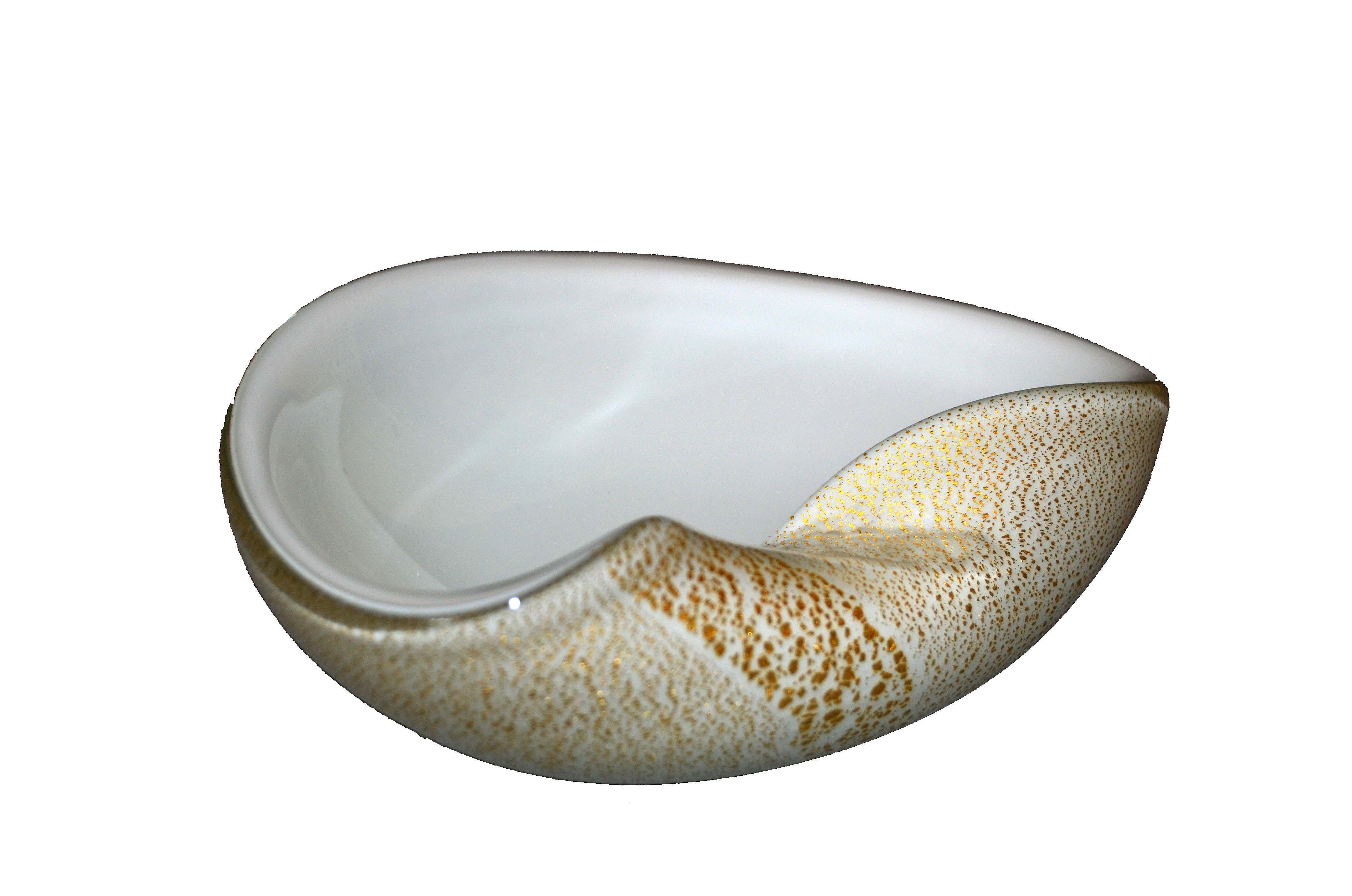 Hand blown white Murano art glass ashtray, decorative catchall or bowl made in Italy and inspired by Alfredo Barbini.
White filled glass with gold leaf speckled.