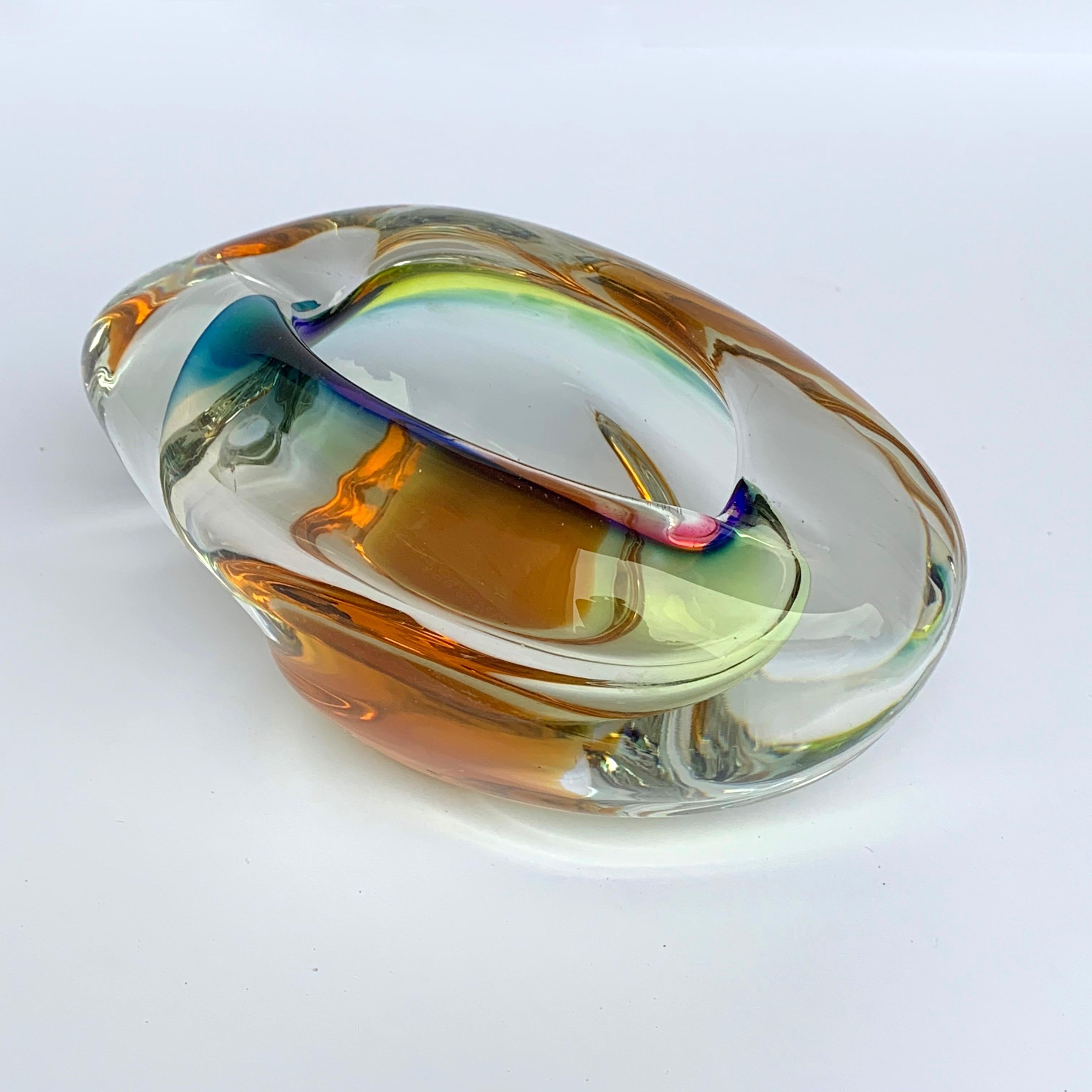 A beautiful glass of multi-color of Murano.
Ashtray or bowl, submerged glass

No chipping.
 
