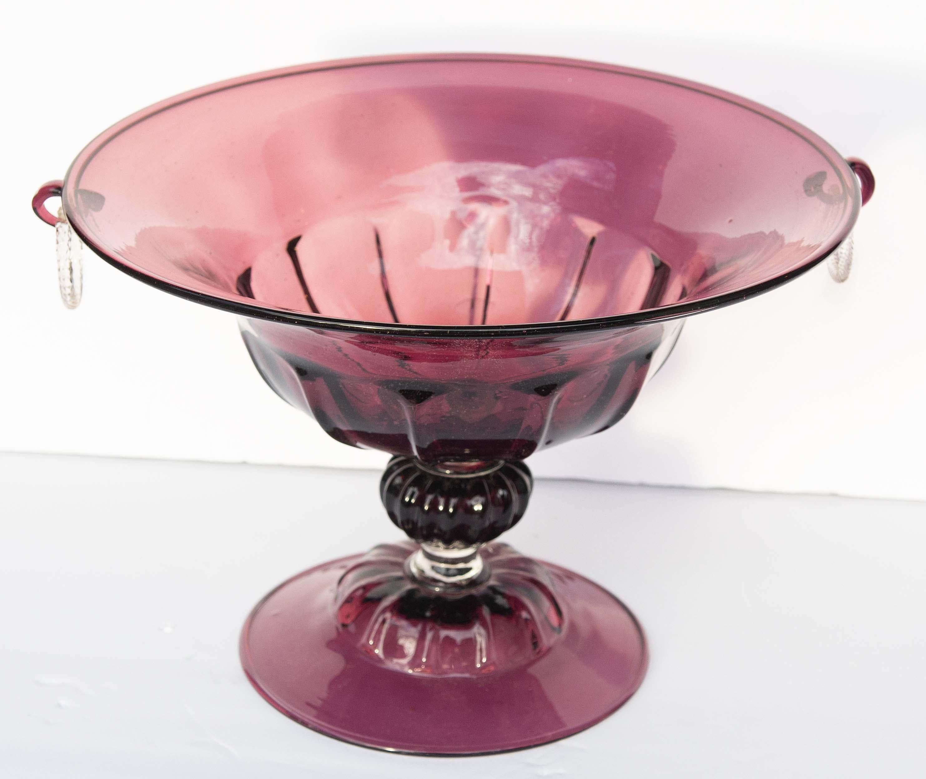 Murano aubergine centerpiece with rope handles. Hand made Venetian glass. 












































































Venini