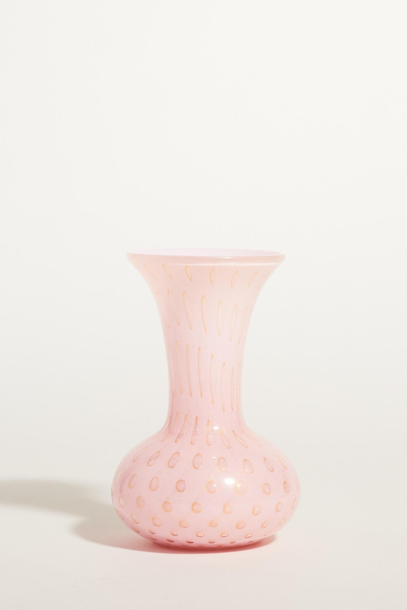 Baby pink Murano glass bud vase with gold circle details.